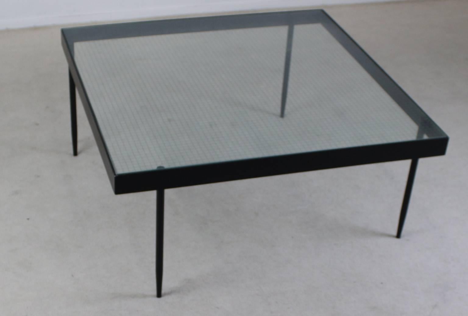 Elegant minimalistic Dutch design.
The legs are not placed on the edge but aside.
Savety glass top.
  