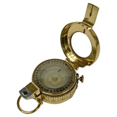 Prismatic surveying compass signed T.G. Co. Ltd. London, 1942