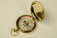 Small brass travel compass by Taylor, used by the army during World War I