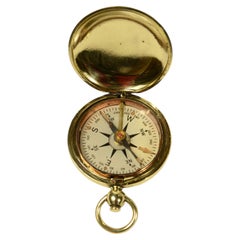 Small brass travel compass by Taylor, used by the army during World War I