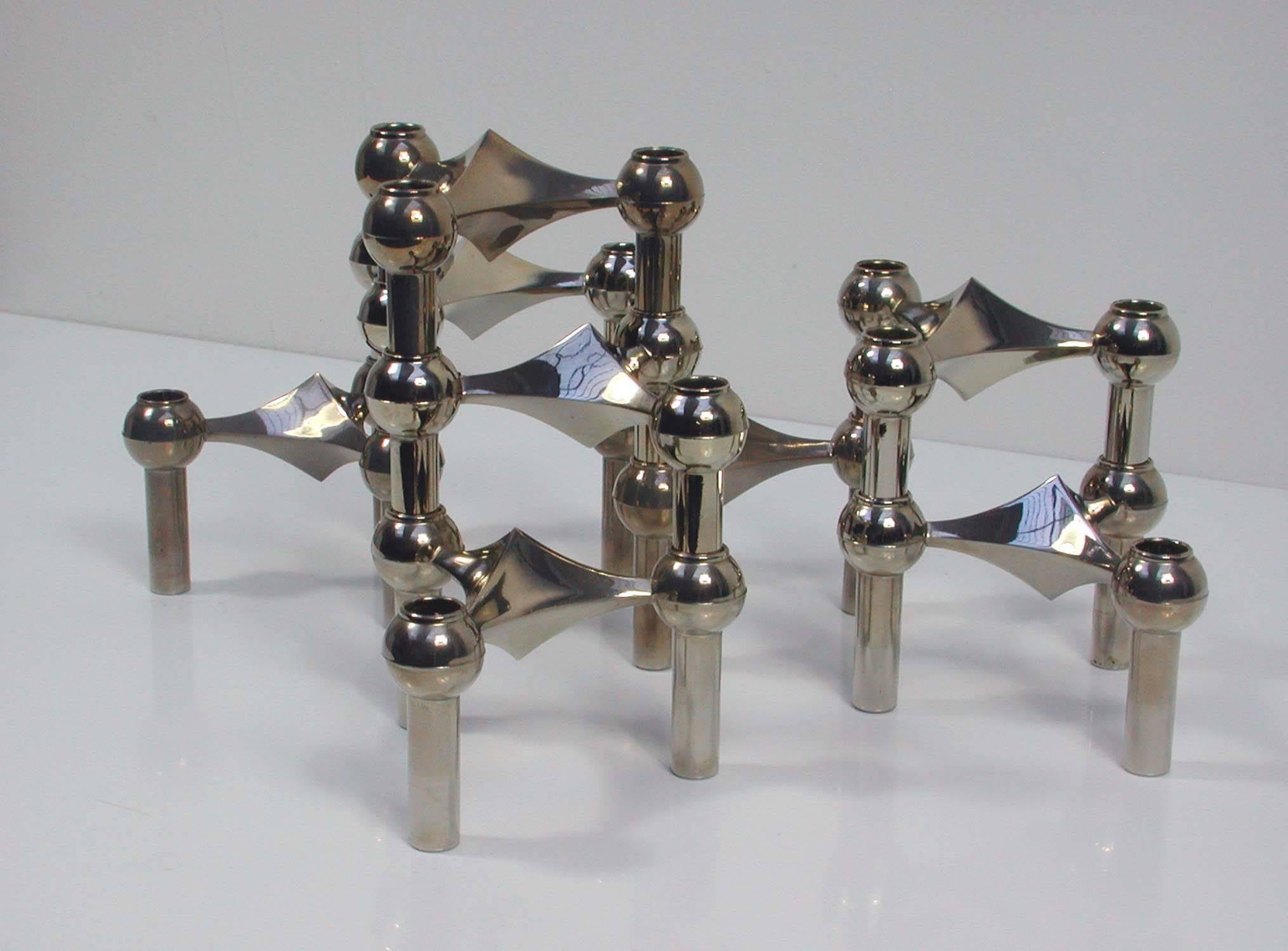 This set of eight modular stacking chrome candlesticks was designed by Fritz Nagel and Caesar Stoffi and produced by BMF in Germany in the 1960s. The candlesticks can be arranged in many different ways.

Each candlestick is app. 4