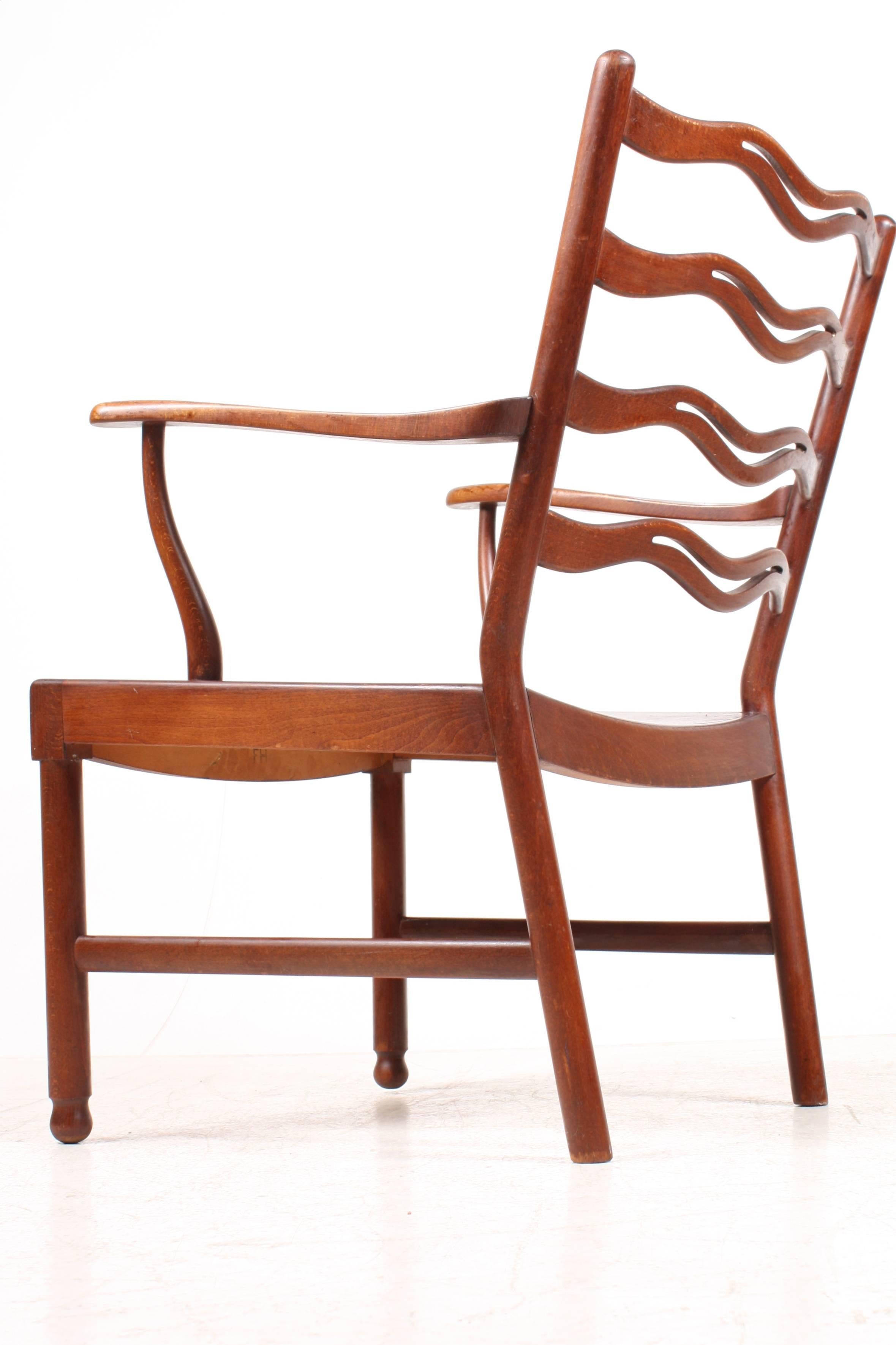 Pair of ladder back lounge chairs by Ole Wanscher designed for Fritz Hansen in the 1940s made in Denmark. Great original condition.