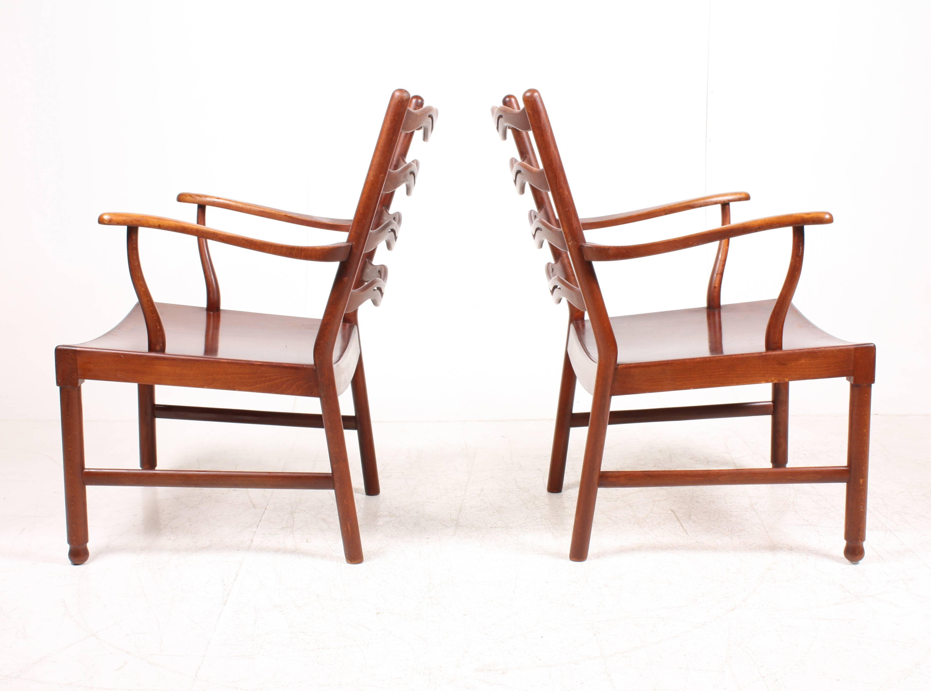 Scandinavian Modern Pair of Ladder Back Lounge Chairs by Ole Wanscher