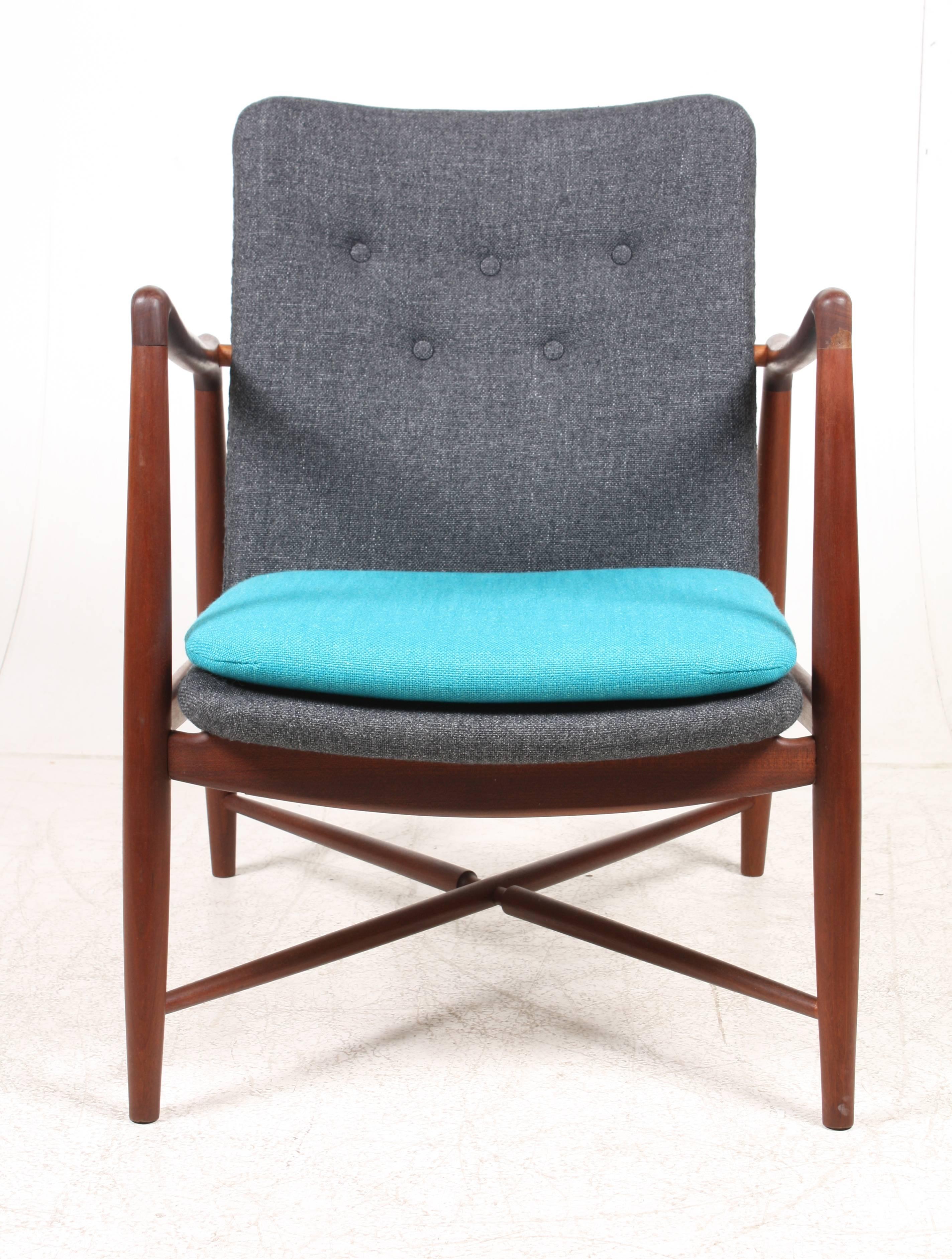 Lounge chair in teak and new fabric, model no. BO59 designed by Finn Juhl for Bovirke cabinet makers, Copenhagen. Made in Denmark. Great condition.