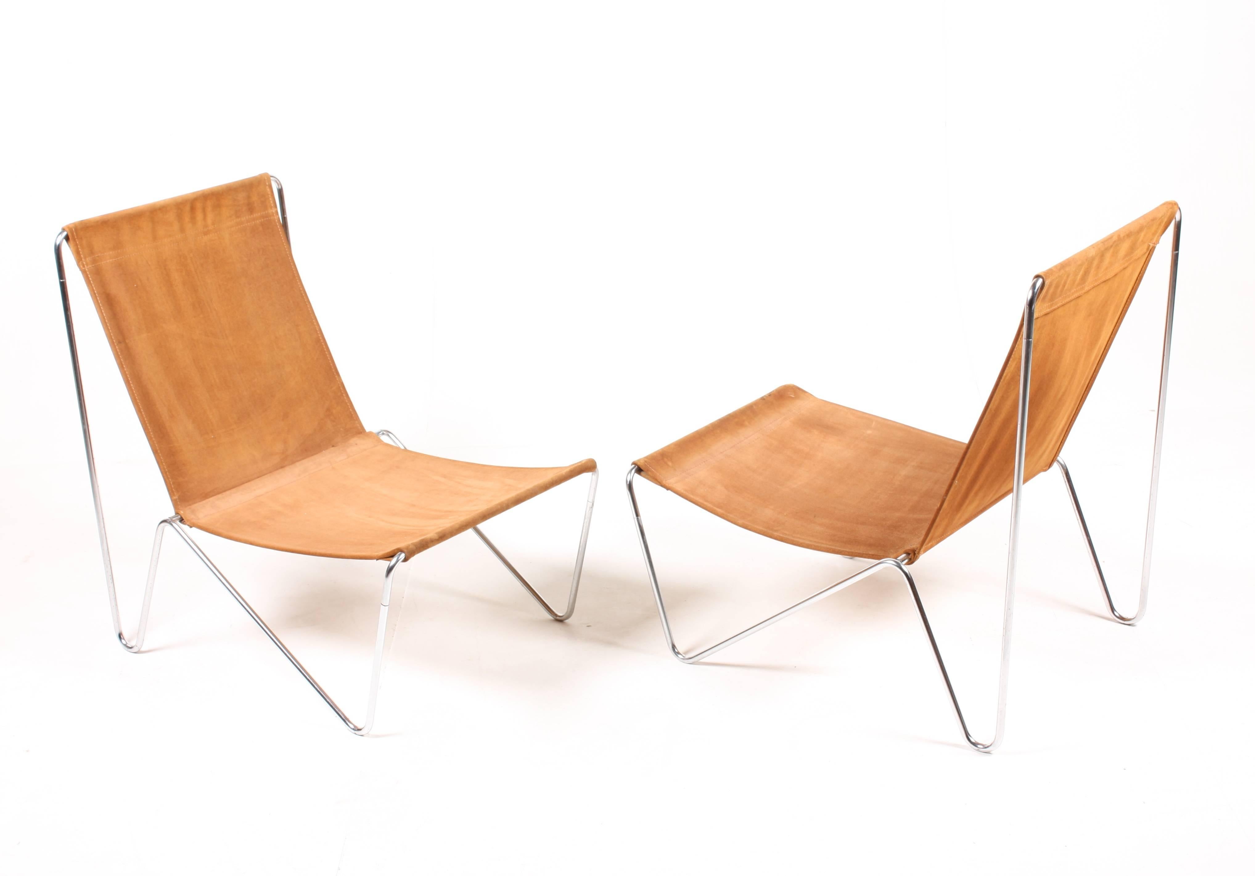 Pair of original bachelor chairs in suede designed by Maa. Verner Panton for Fritz Hansen in 1955. Verner Panton’s simple, iconic bachelor chair from 1955 is a light design, made to move around easily, inside or outside. Great original condition.