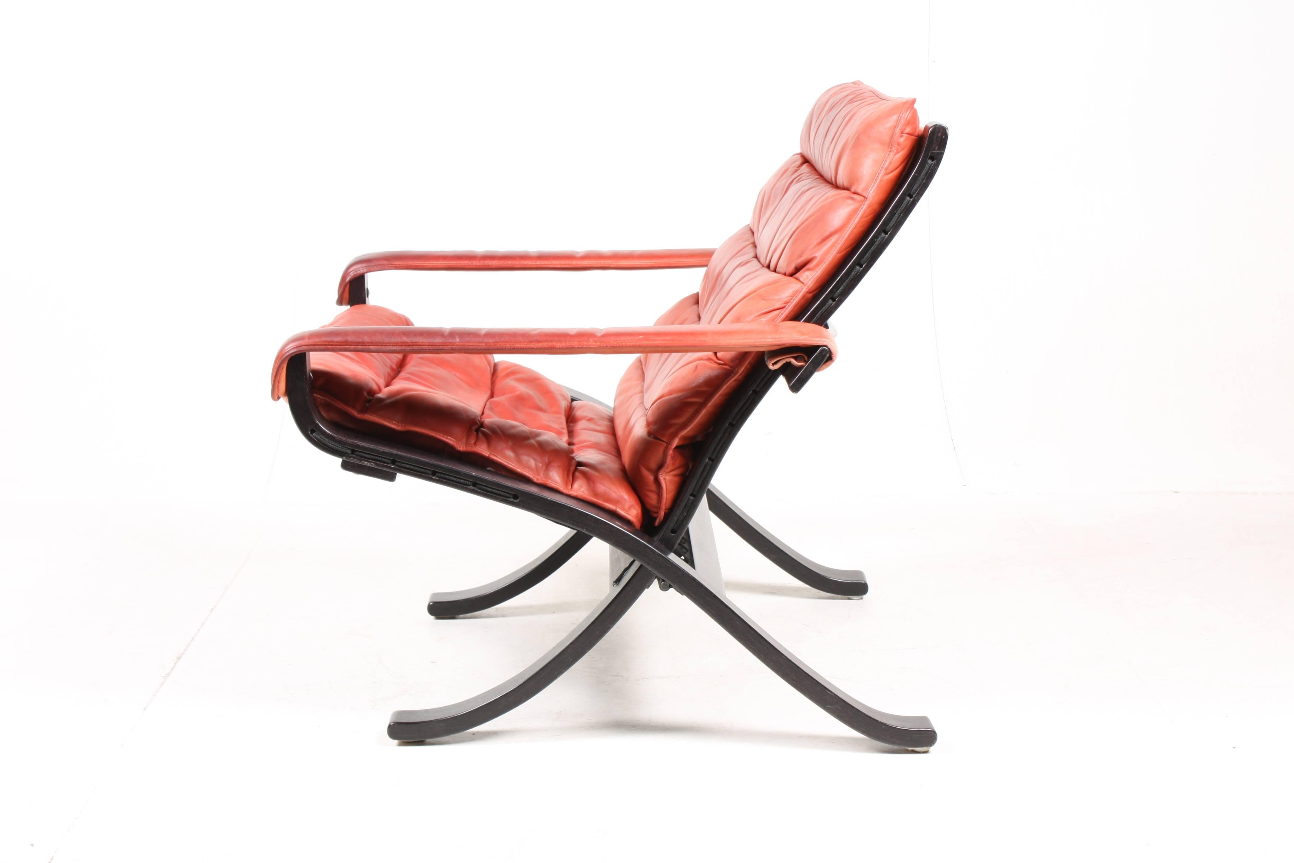 Pair of great looking lounge chairs in plywood and patinated leather designed by Ingmar Relling in 1970s. Made in Norway. Great original condition.

The lounge chairs are cleaned and waxed. Comes from a non-smoker home. Very nice original