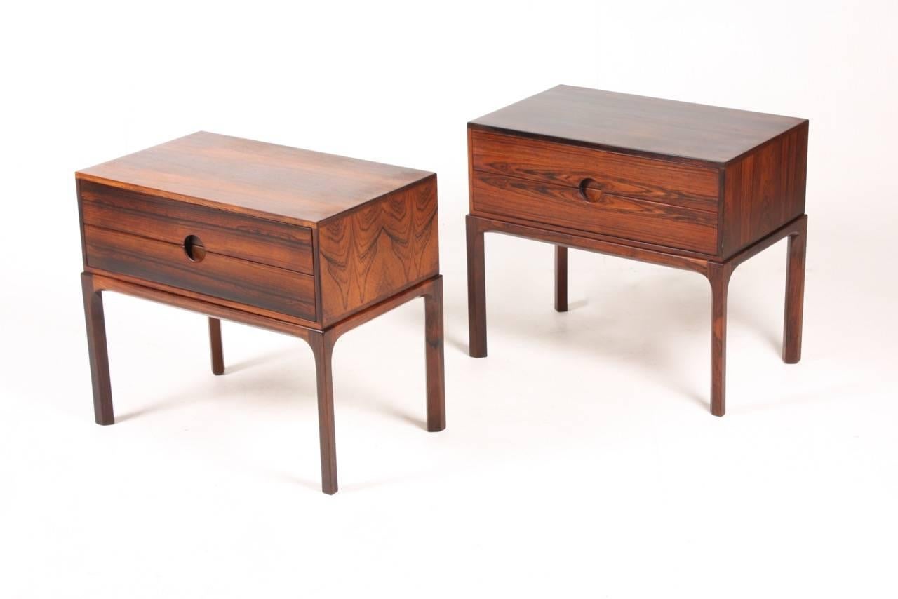 Pair of great looking rosewood nightstands designed by Kai Kristiansen. Made by Aksel Kjersgaard cabinetmakers Denmark in the 1960s. Very nice condition.