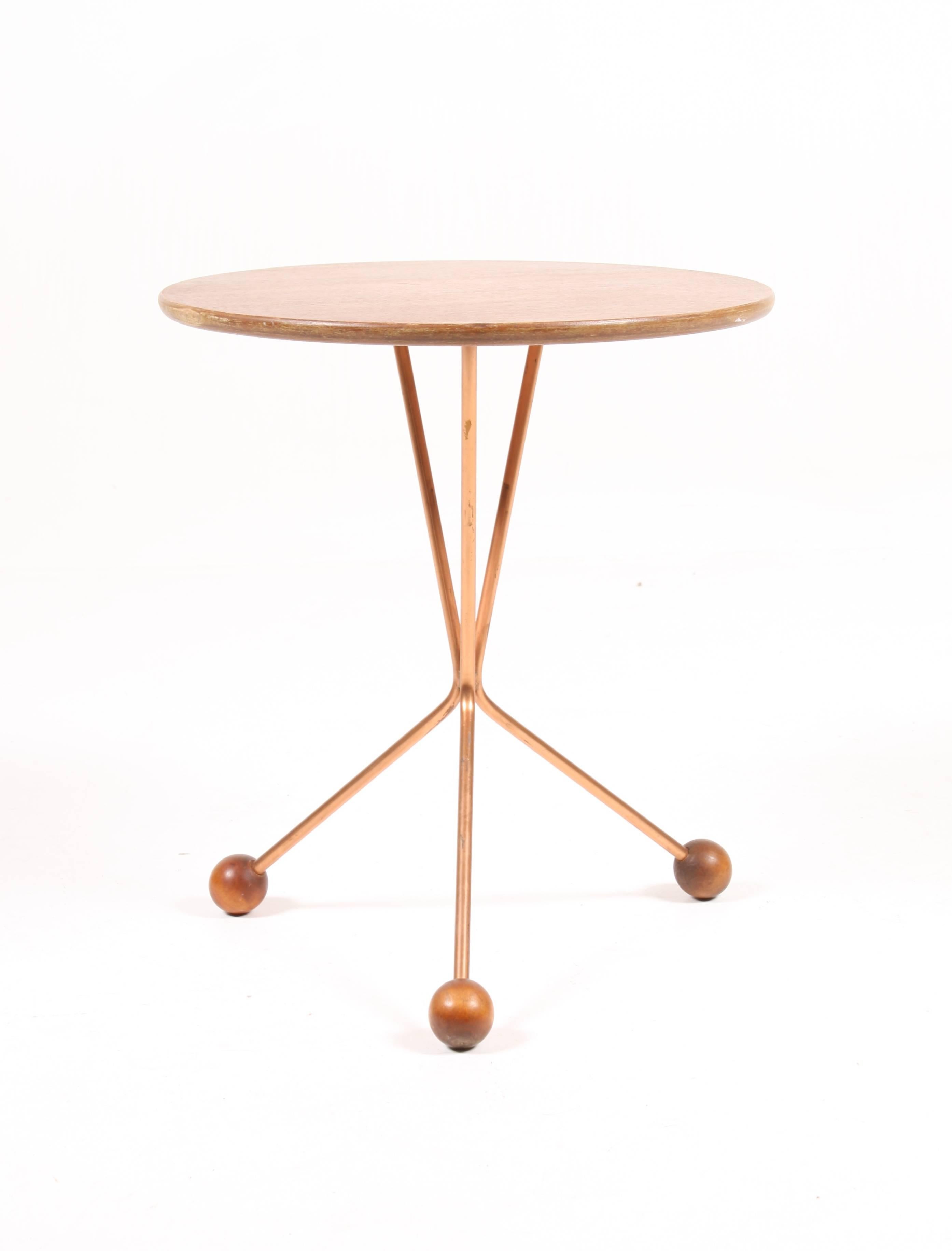 Side table in teak and brass designed by Albert Larsson for Alberts Tibro. Made in Sweden in the 1960s. Great original condition.