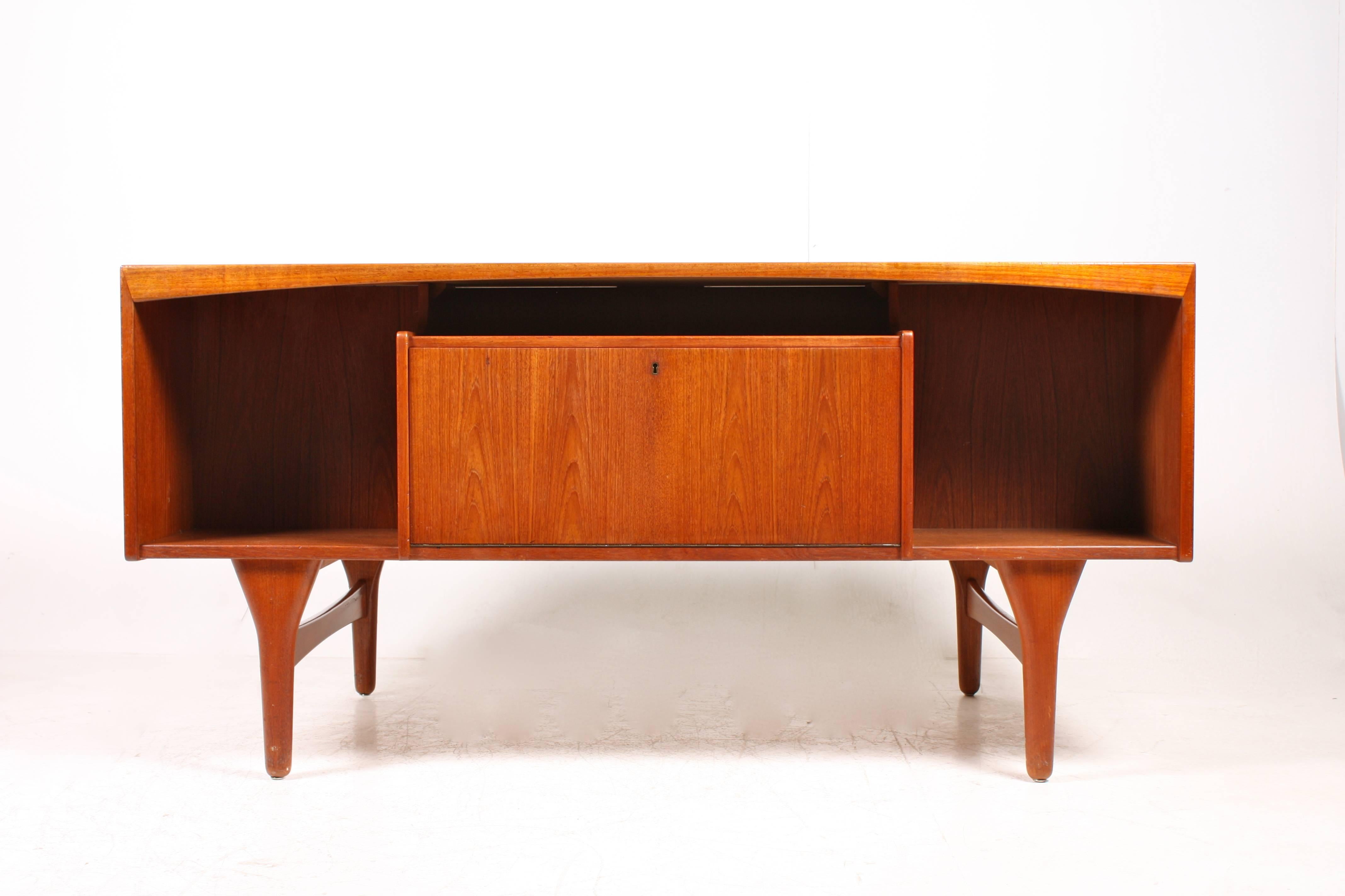 Free standing teak desk designed by Valdemar Mortensen and made in  Denmark in the 1960's. Great condition.