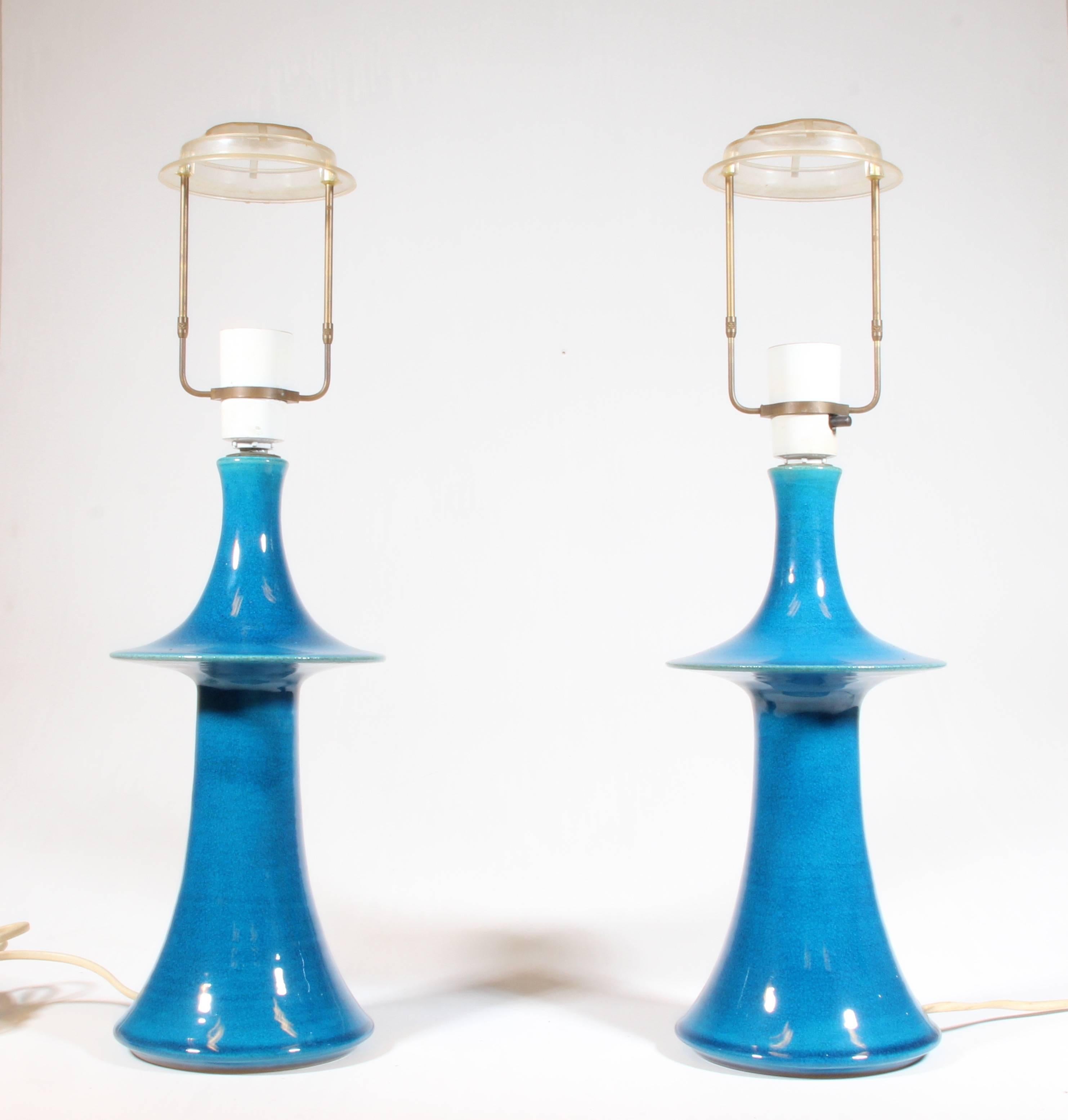 Pair of blue hand glazed ceramic tables lampes by Nils Kähler. Height of the pieces with holder 50 cm and without 32 cm. 