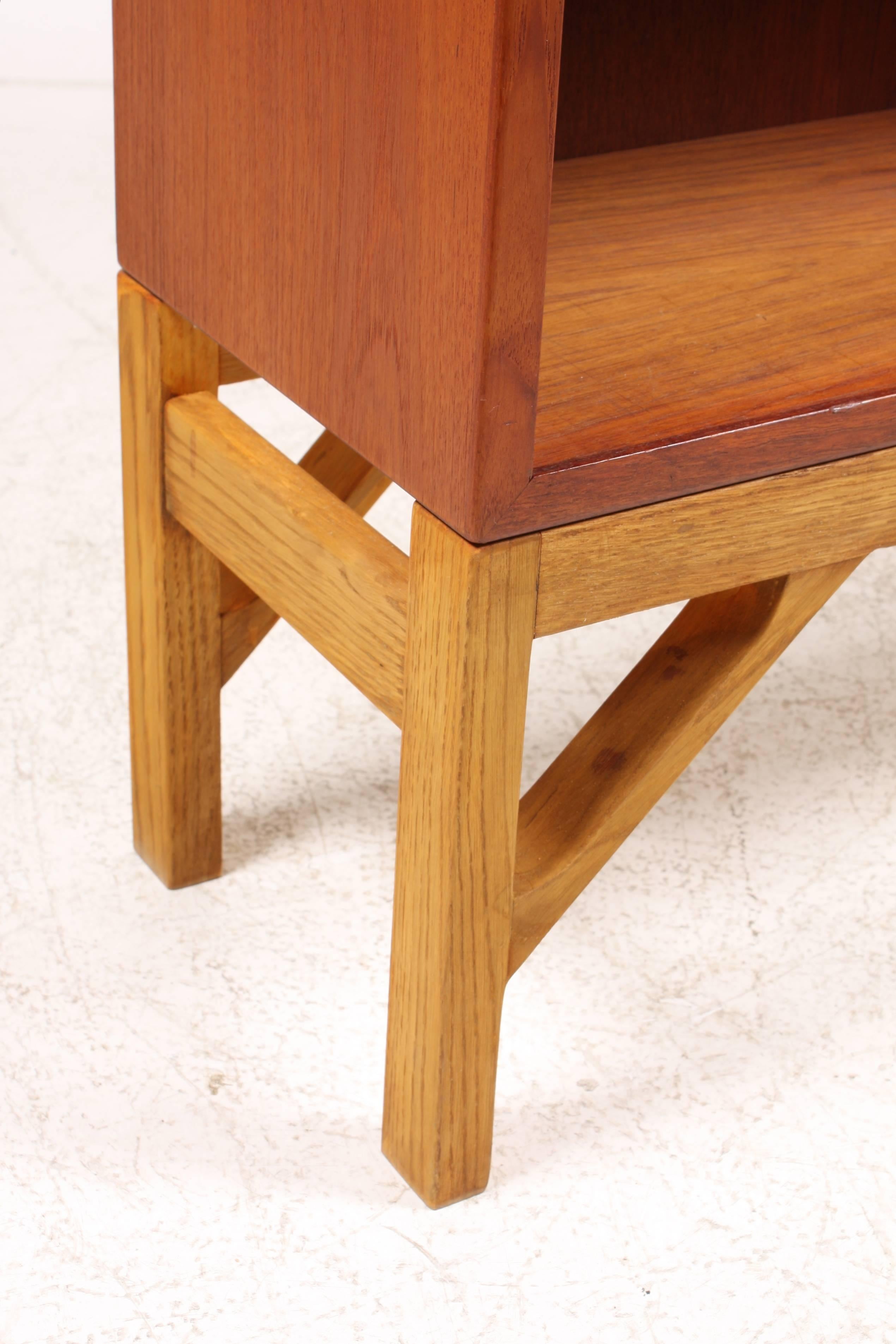 Low China bookcase in teak on a solid oak base. Designed by MAA. Børge Mogensen in the 1958, this piece is made by CM Madsen Cabinetmakers Denmark in the 1960s. Great original condition. More shelves available - a pair is also available.