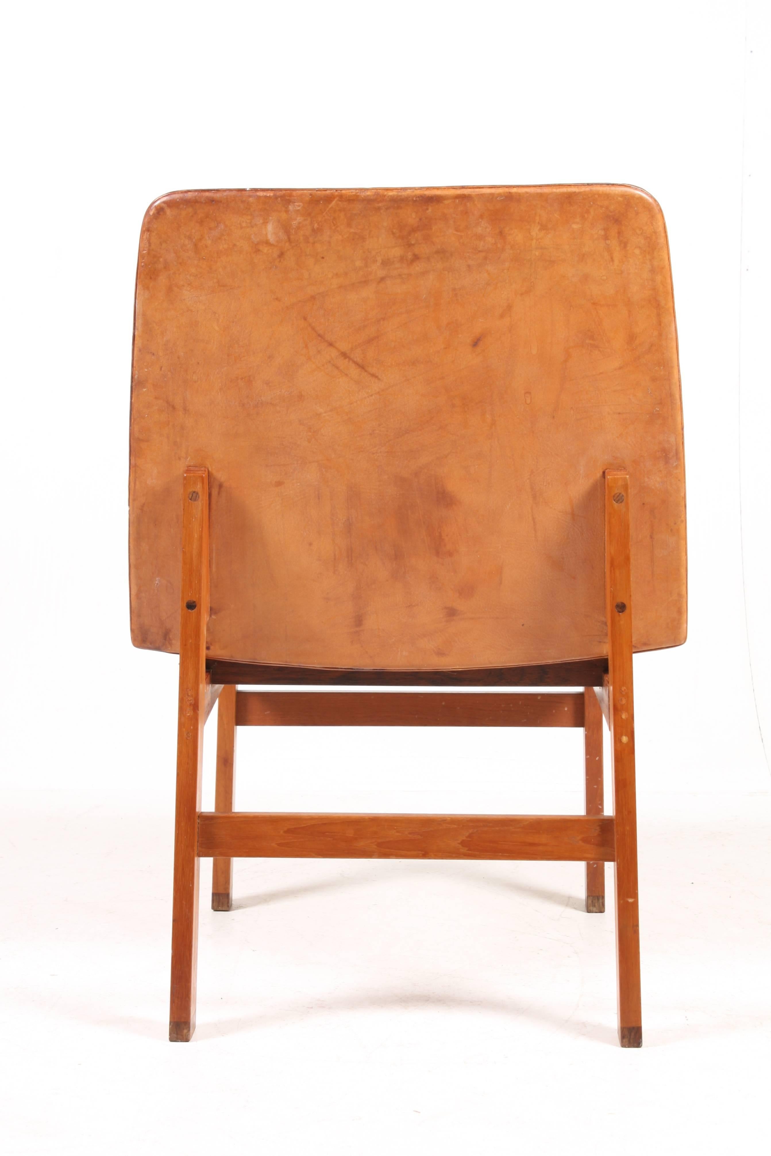 Teak Great Looking Chair in Patinated Leather