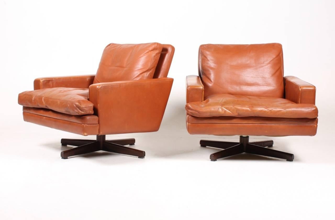 Norwegian design lounge chairs in patinated brown leather and rosewood. Designed by Maa. Fredrik Kayser for Vatne in 1960s. Made in Norway. 

The sofa is cleaned, waxed and is from a non smoker home. Very nice original condition.