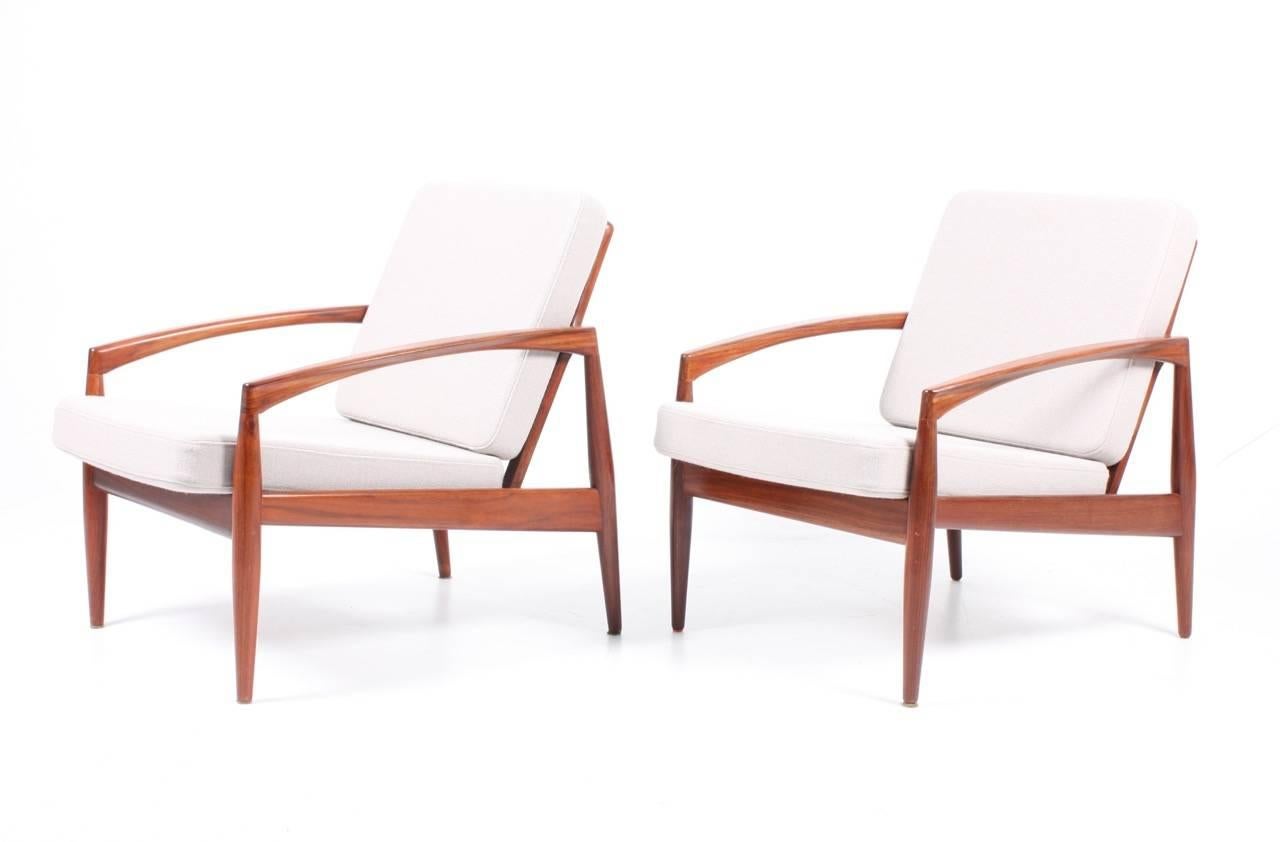 Pair of lounge chairs model paper knife in rosewood, upholstered with new fabric.
Designed by Kai Kristiansen, Made by Magnus Olesen furniture, Denmark, 1960s.