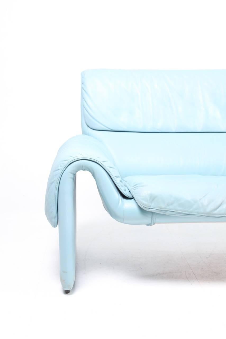Great looking and very comfortable three-seat sofa in baby blue leather. Designed and made by De Sede in Switzerland, 1980s. The sofa been cleaned, waxed and is from a non-smoker home. Original condition.