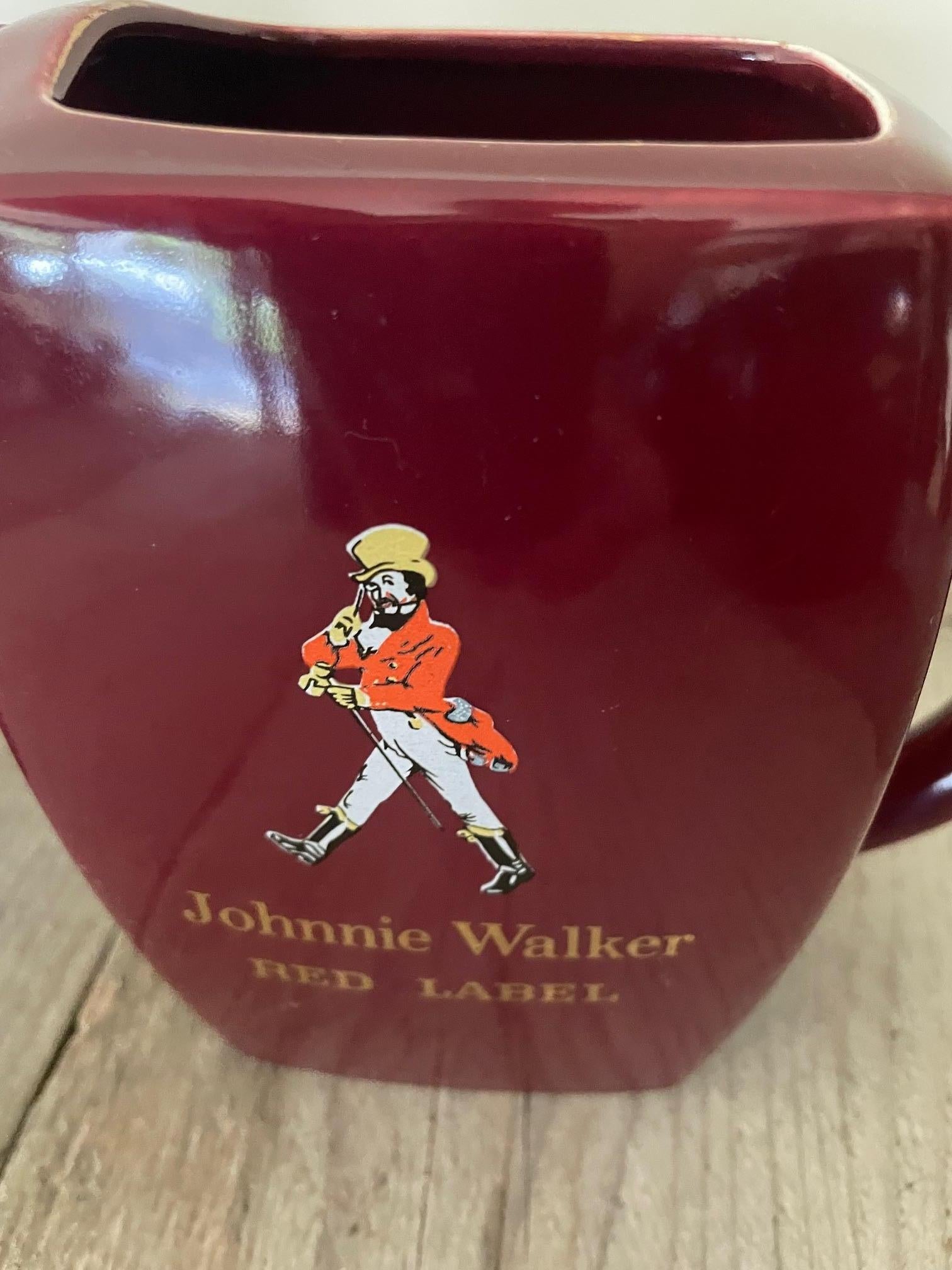 This Glaymore and Johnnie Walker earthenware water pitcher was used for advertising purposes in cafés in the 1950s.