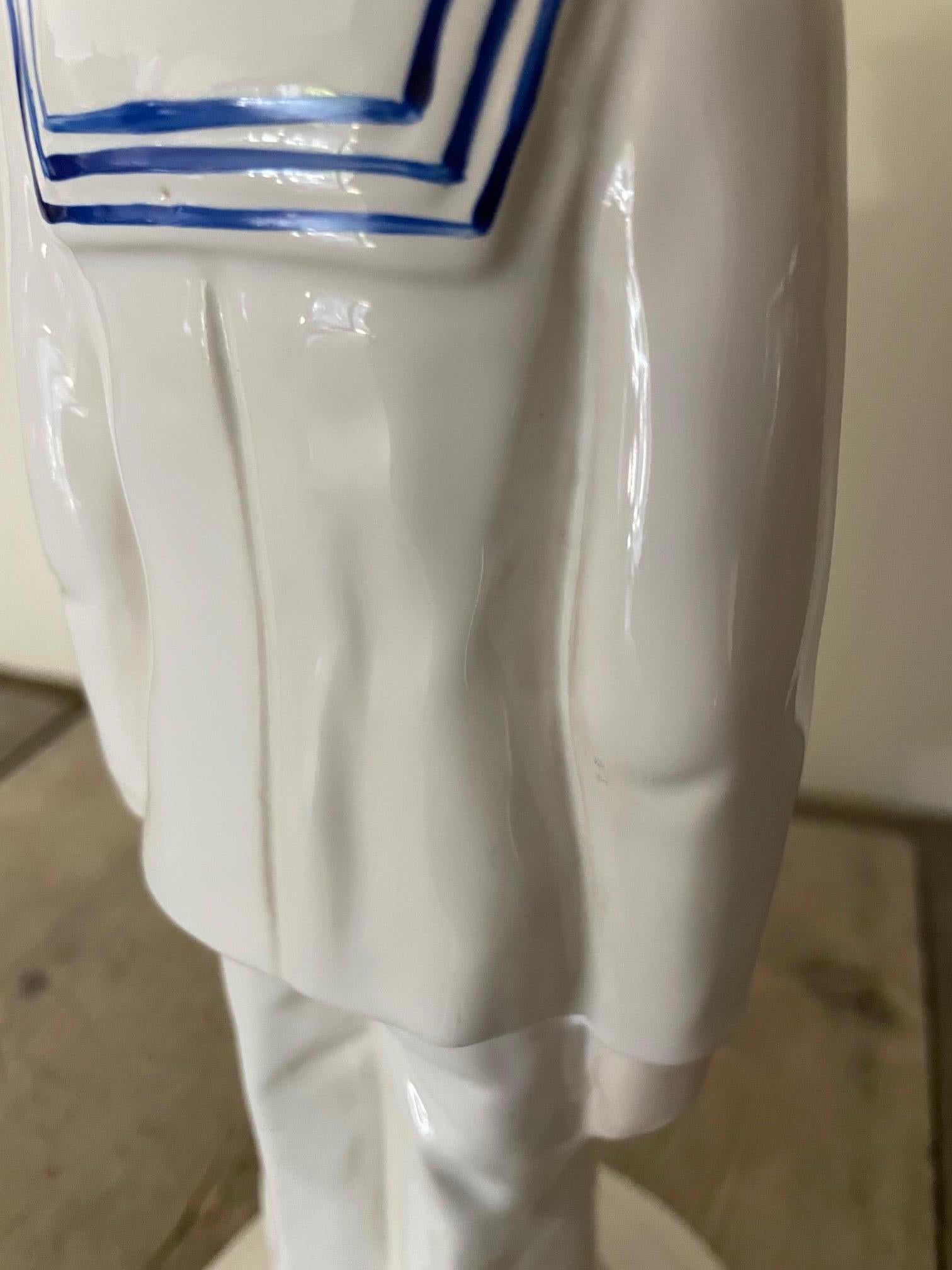 Statuette of a sailor in faience For Sale 1
