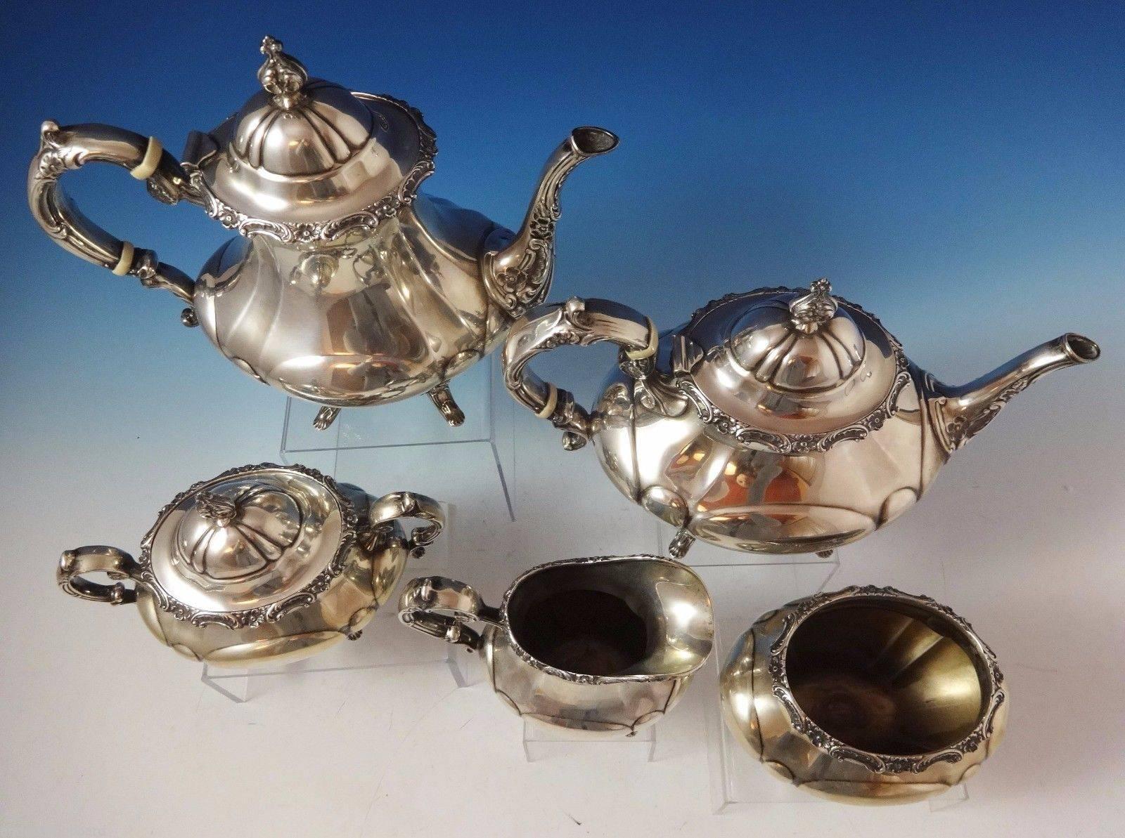 Georgian Rose by Reed & Barton.

Georgian Rose by Reed and Barton sterling silver five-piece tea set. It is marked with #670 and the set weighs 85.9 ozt. The set includes:

Coffee pot: Weighs 27 ozt., and it measures 9 1/2 x 10 1/4