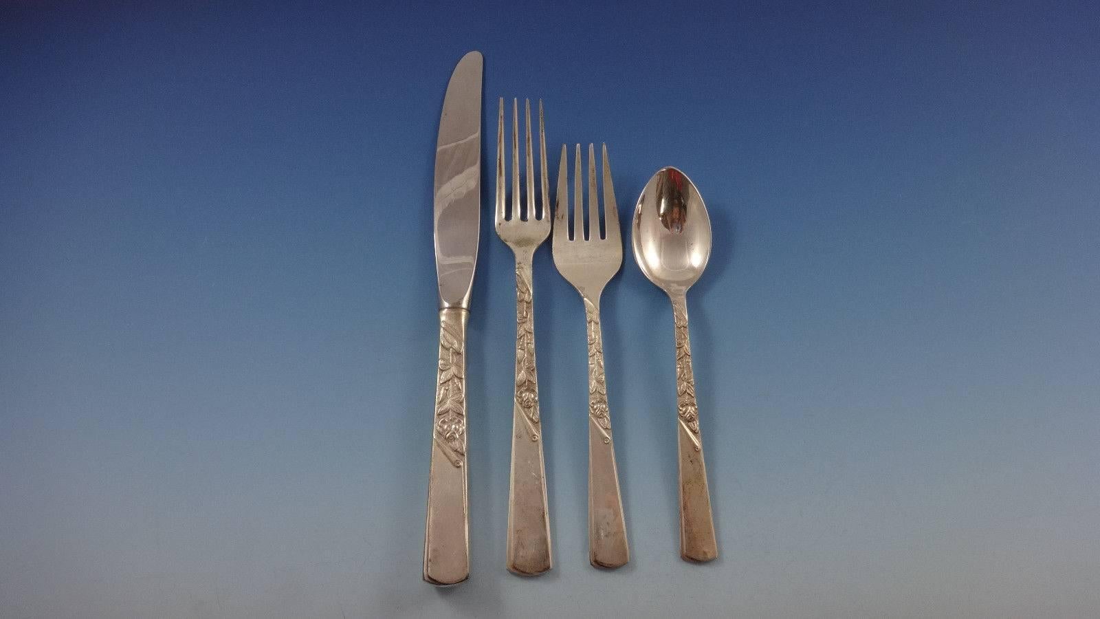Rose motif by Stieff sterling silver flatware set of eight service 32 pieces.

Eight knives, 9
