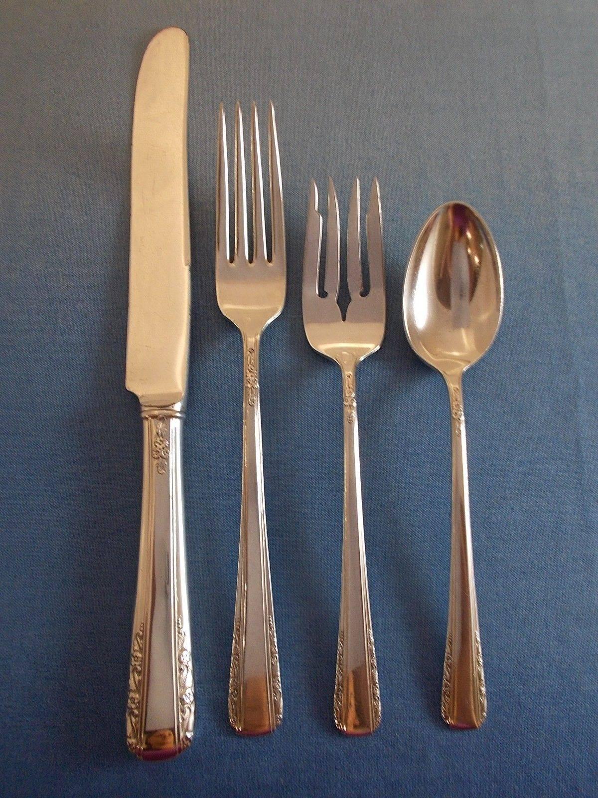 Courtship by international sterling silver flatware set of 35 pieces. This set includes: 
8 KNIVES, 9 1/8
