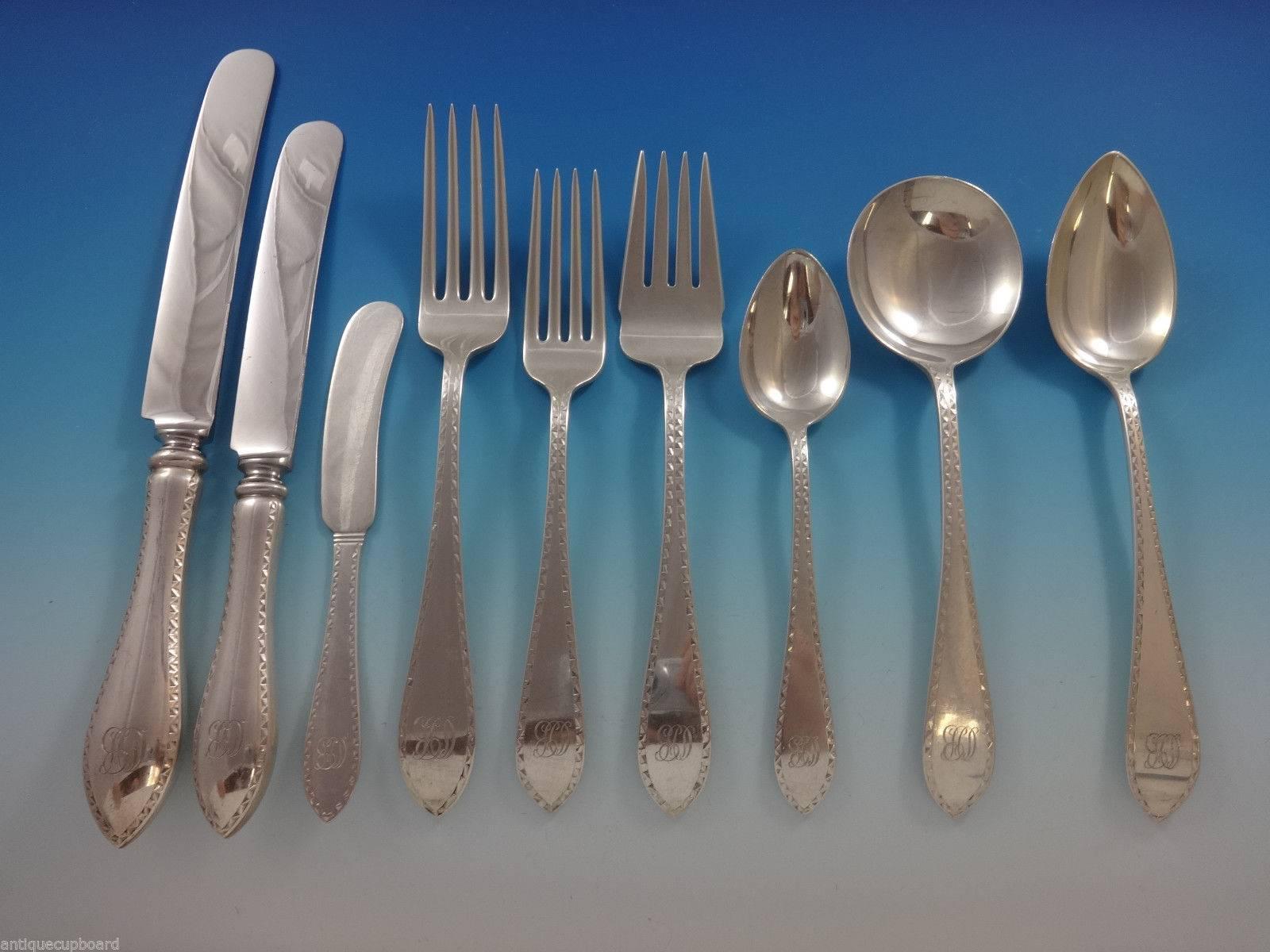 Beautiful pointed antique engraved by Dominick & Haff huge dinner & luncheon sterling silver flatware set - 119 pieces. This set includes:

12 dinner size knives, 9 1/2