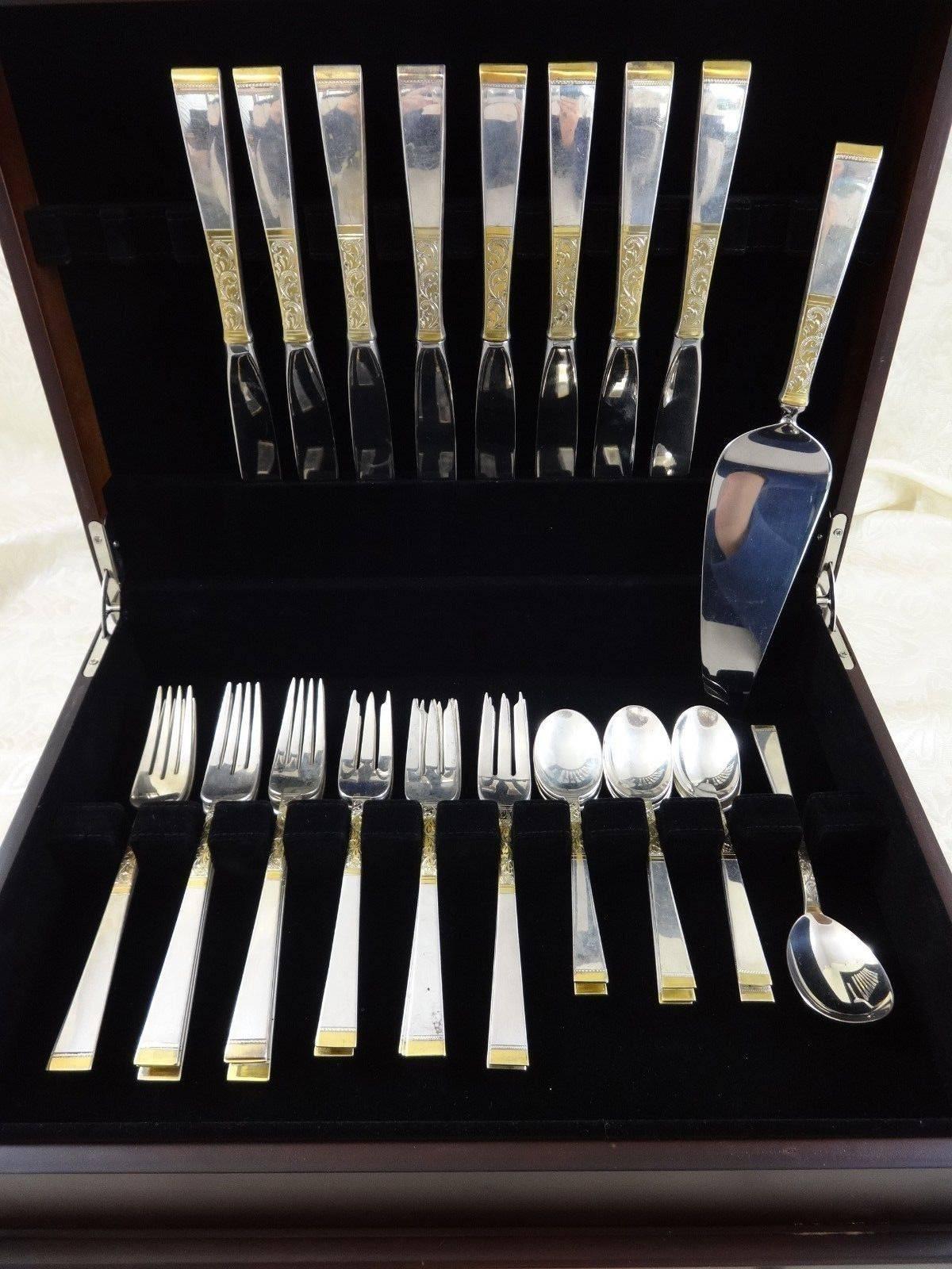 Beautiful Golden Scroll by Gorham sterling silver flatware set of 34 pieces. This set includes:

Eight place size knives, 9 1/8