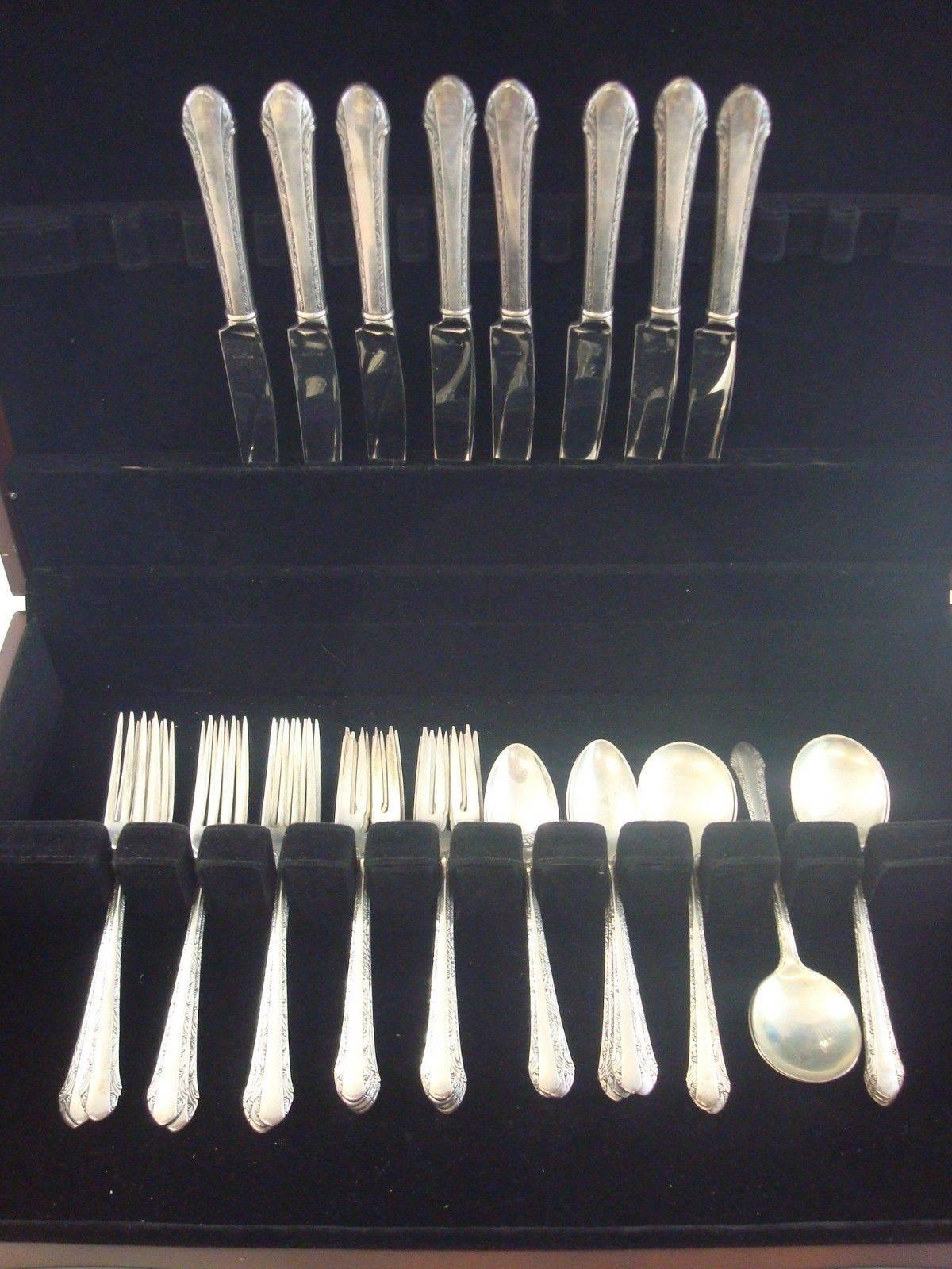 Chased Romantique by Alvin sterling silver flatware set of 40 pieces. This set includes:

Eight knives, 9