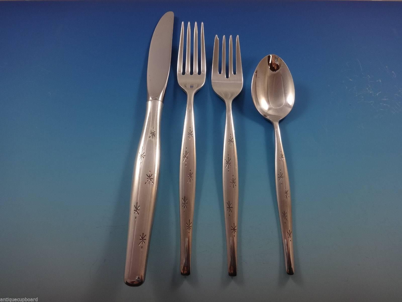 Mid-Century Modern Stardust by Gorham, circa 1956 sterling silver flatware set - 28 pieces. Great starter set! This set includes:

Six knives, 9 3/8