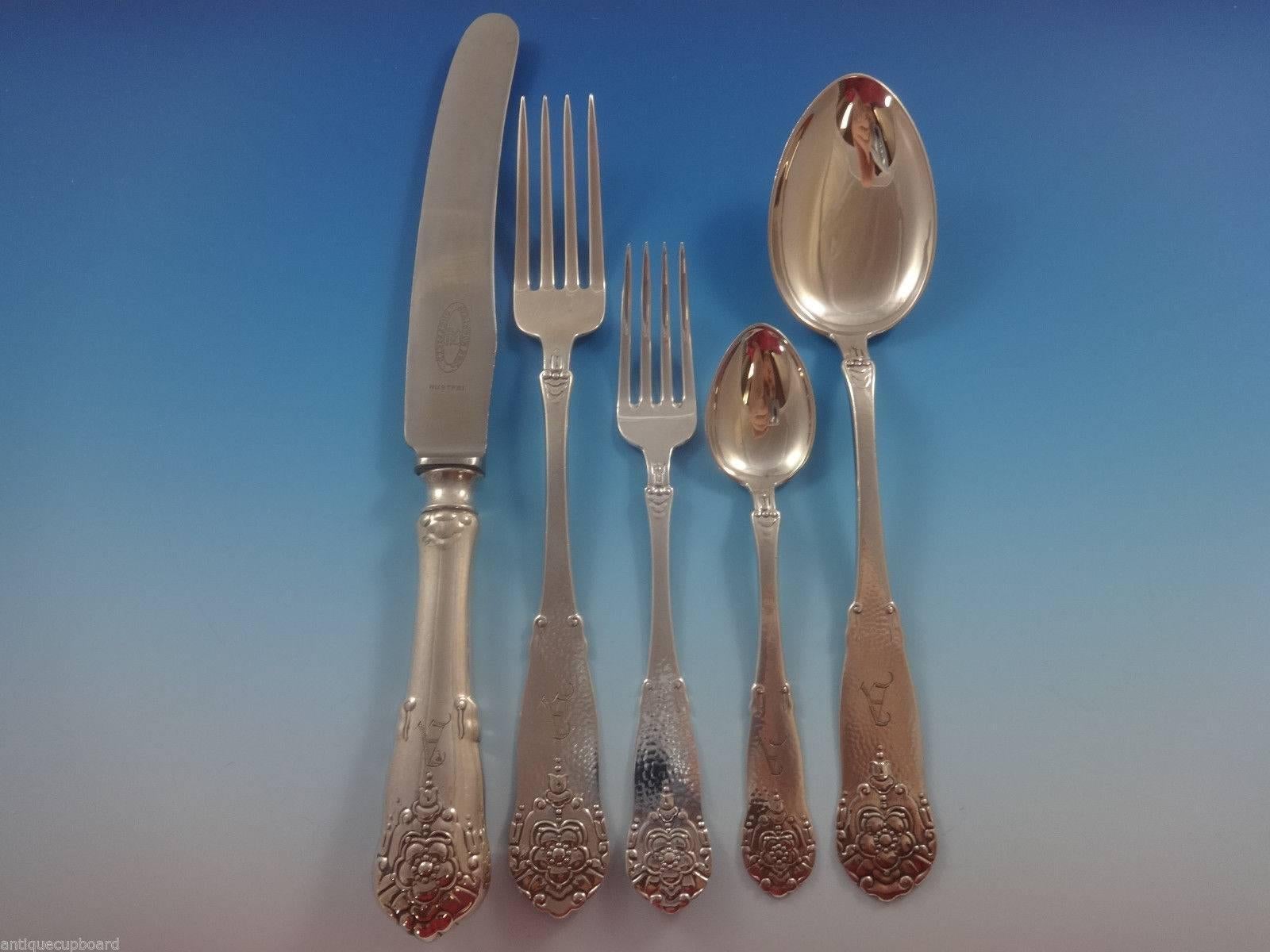 HARDANGER BY TH. OLSENS Scandinavian 830 silver Flatware set, hand hammered with dahlia-style flower - 41 Pieces. This set includes:

8 DINNER KNIVES, 9 3/4
