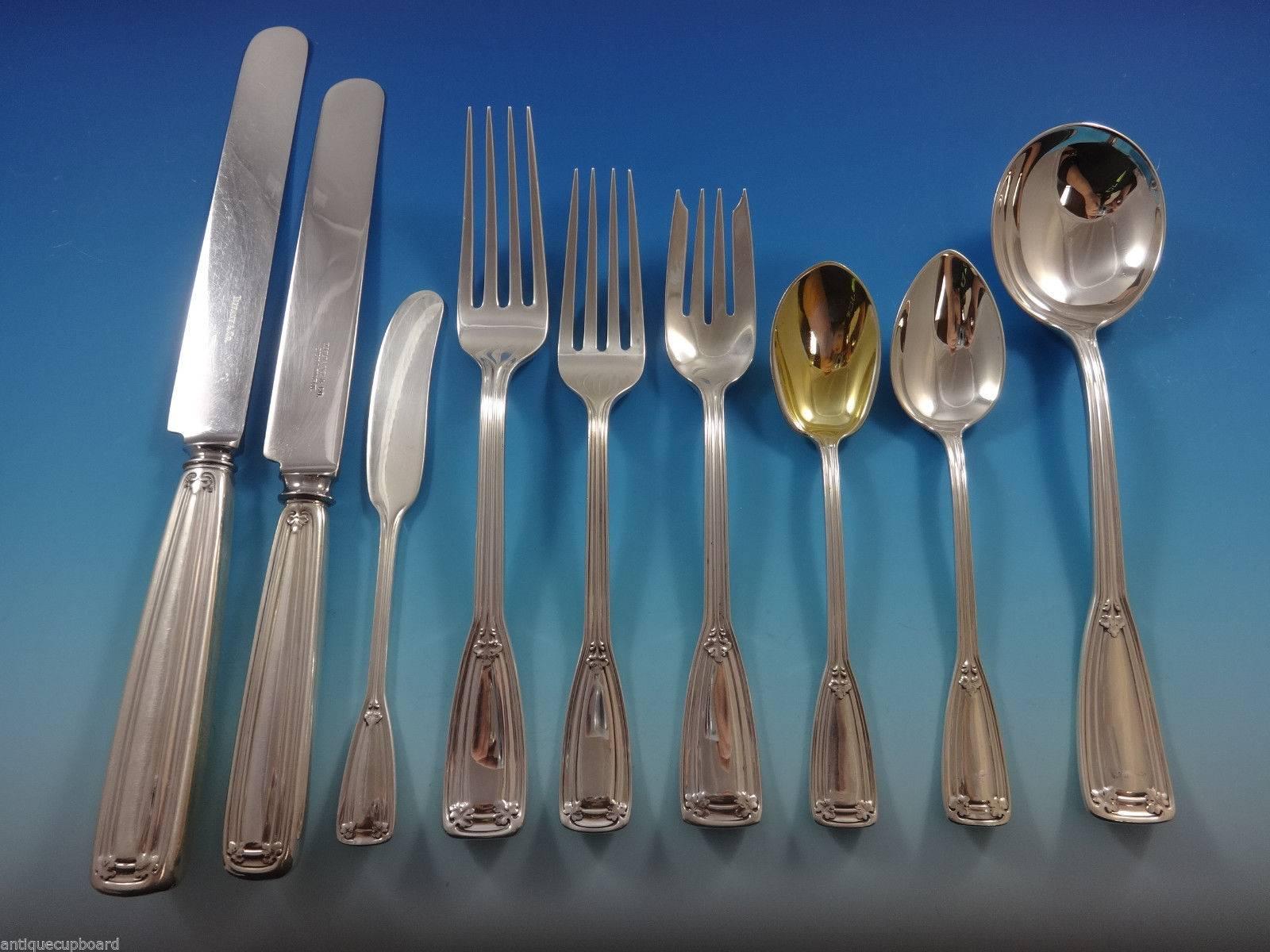 Saint Dunstan by Tiffany & Co. sterling silver dinner flatware set - 66 pieces. This set includes:

Six dinner size knives, 10 1/8