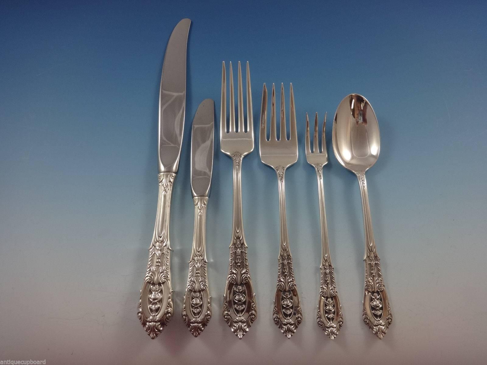 Intricate piercings and brilliant craftsmanship define this Rose Point sterling silver flatware, sure to become a treasured family heirloom. The design of silver lace and a floating rose amidst deep scrolls and shimmering dew drops will grace your