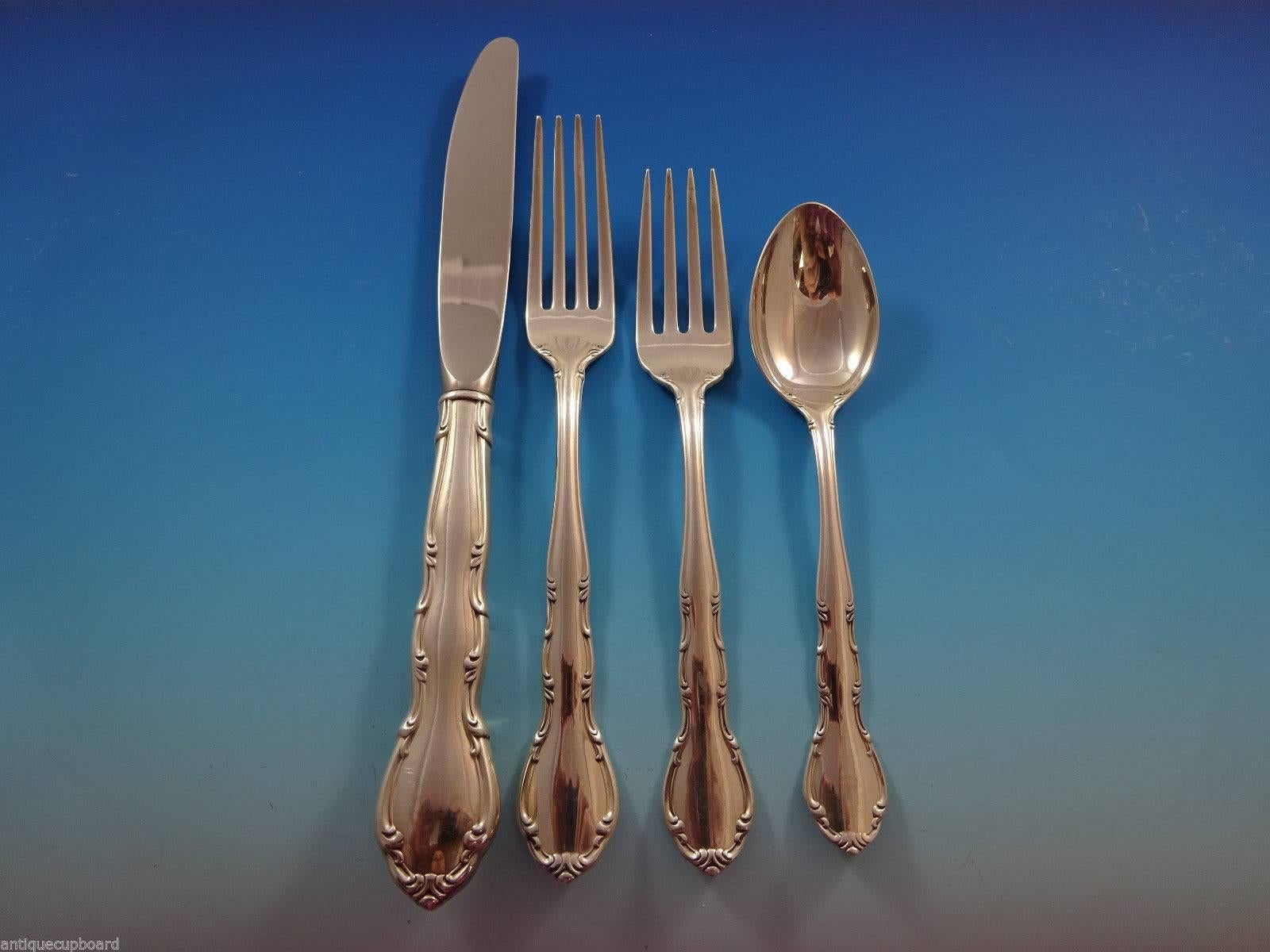 Andante by Gorham sterling silver flatware set of 33 pieces. This set includes:

Eight knives, 9