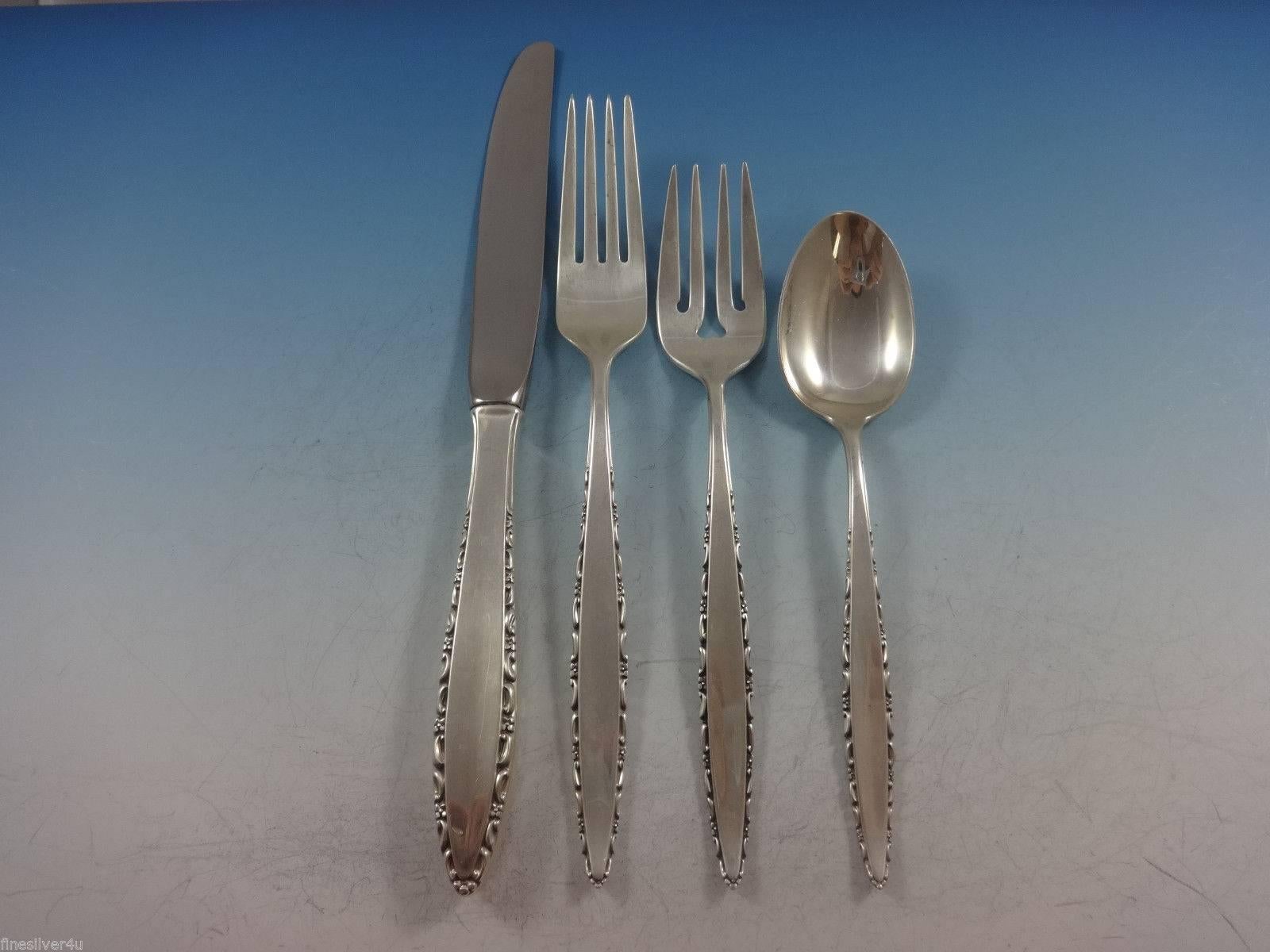 Stunning Lace Point by Lunt sterling silver flatware set of 74 pieces. This set includes:

12 knives, 9