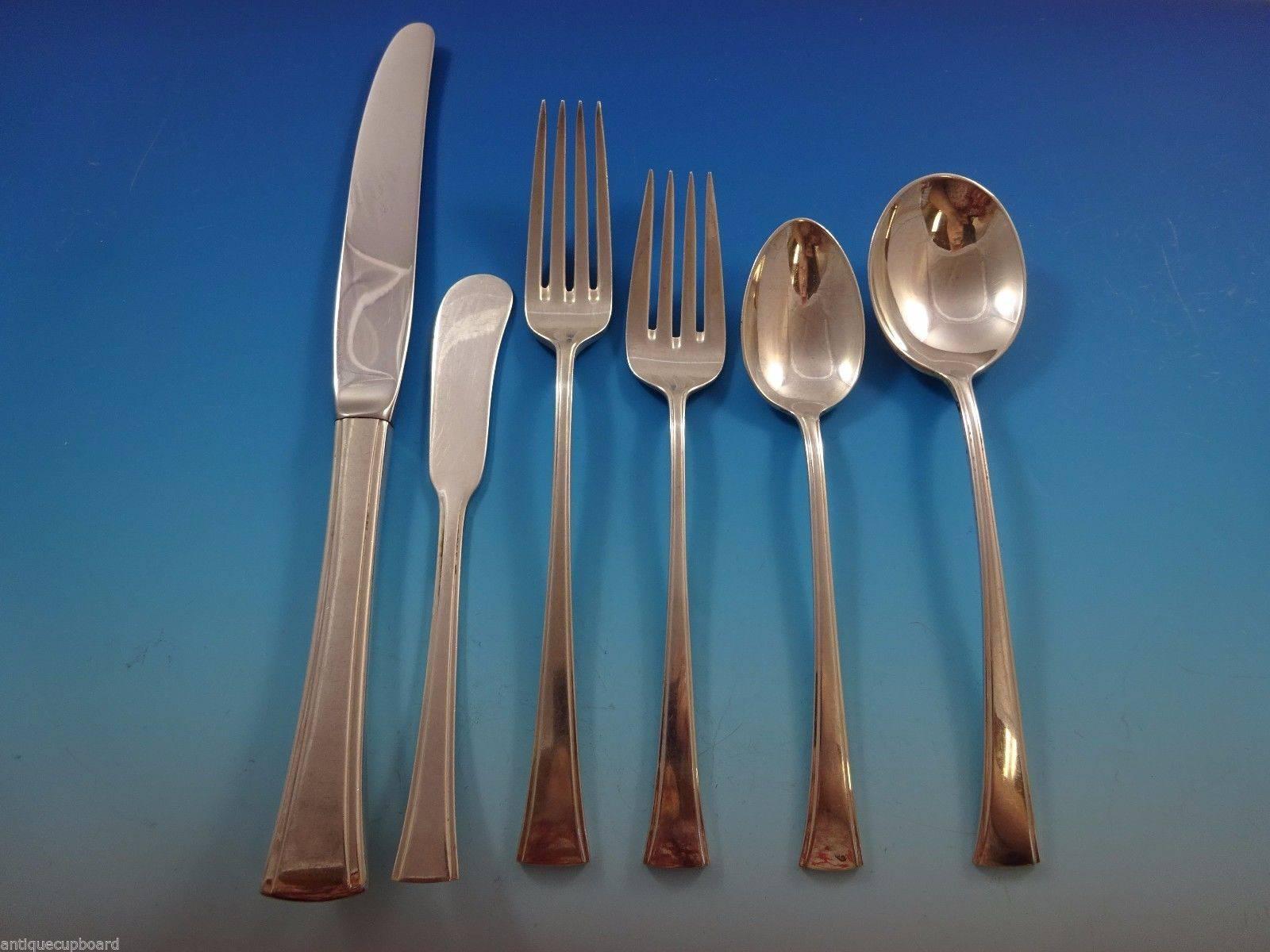 Tranquility by International sterling silver flatware set, 41 pieces set. This set has a modern look with simple lines. This set includes:

Six knives, 9 1/8