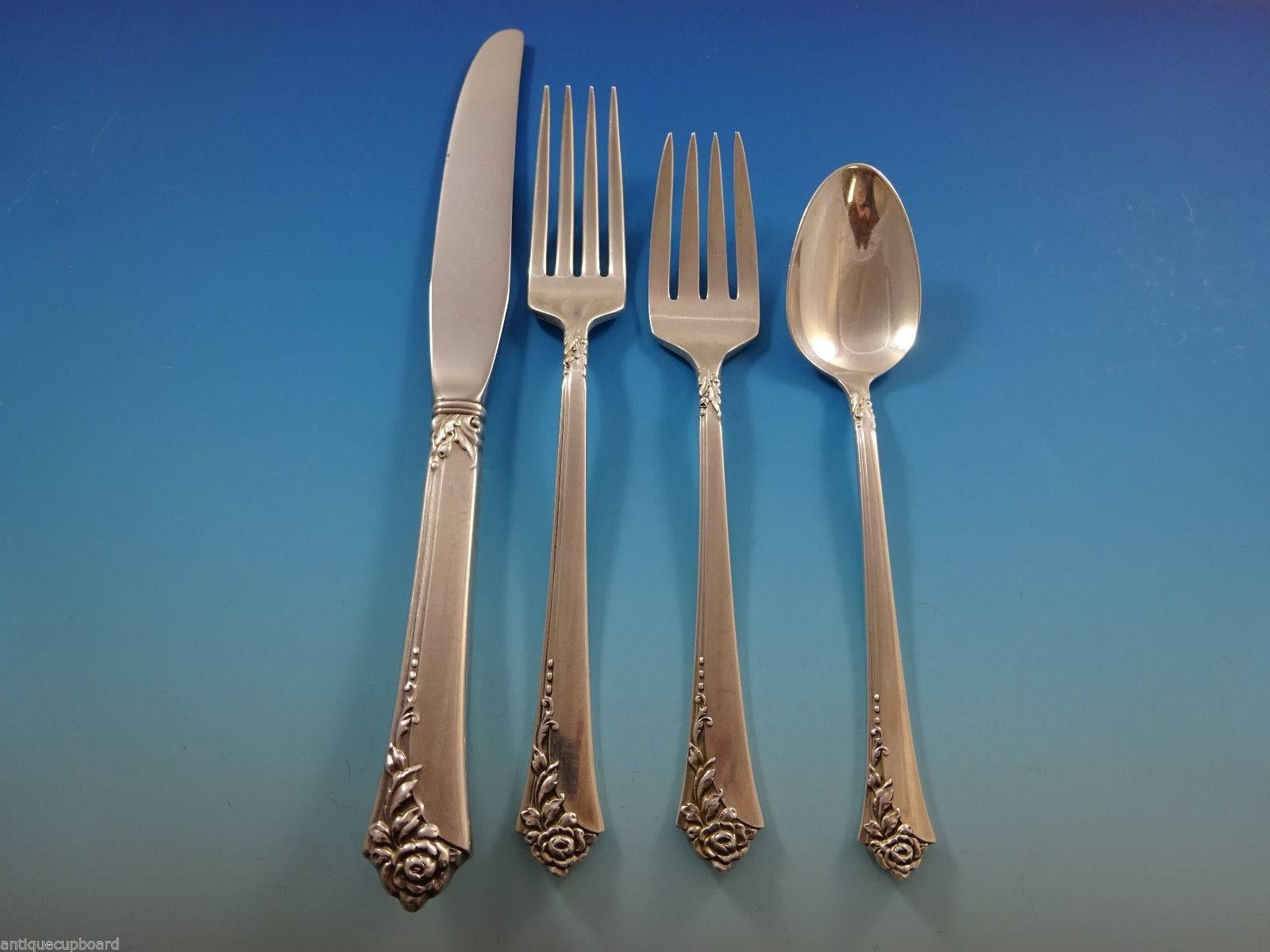 Damask Rose is a popular pattern that was released in the year 1946. The pattern has a three-dimensional rose motif with a modern twist.

Damask Rose by Oneida sterling silver flatware set, 48 pieces. This set includes:

12 knives, 9