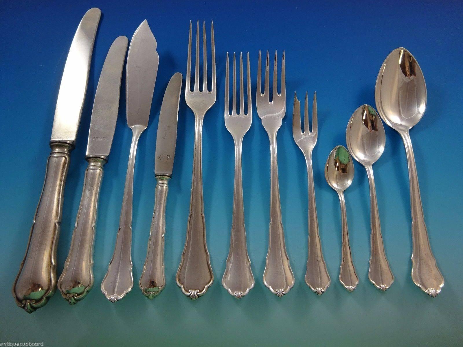 Chippendale by H B Hammer German 800 silver flatware set of 140 pieces. This set includes:

12 dinner size knives, 10