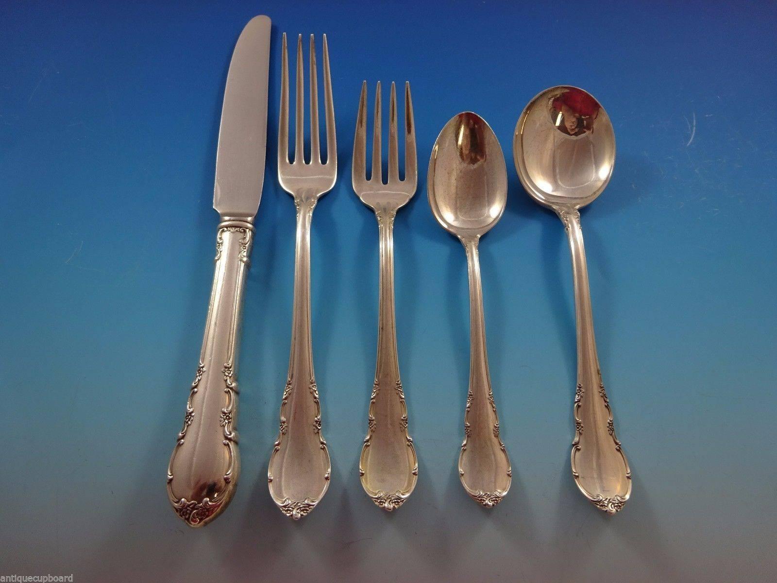 This graceful, sterling silver flatware conveys romance and elegance in every piece. A lovely border of crisp, tiny blossoms and simple scrolls frame a broad center panel of smooth, gleaming silver.

Modern Victorian by Lunt sterling silver
