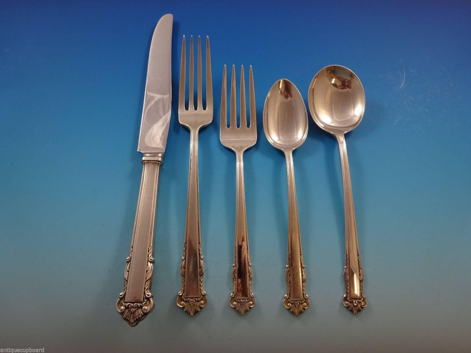 Beautiful English Shell by Lunt sterling silver flatware set of 68 pieces. This set includes:

12 knives, 8 7/8