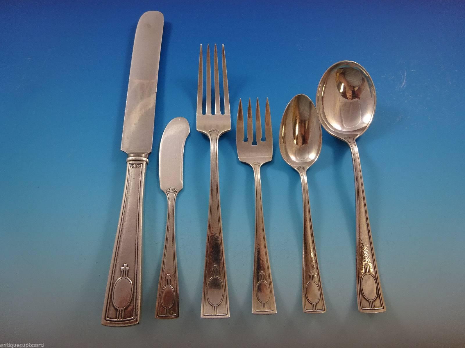 Arts & Crafts Carthage by Wallace Sterling silver dinner size flatware set of 58 pieces. This set includes:

Eight dinner size knives, 9 5/8