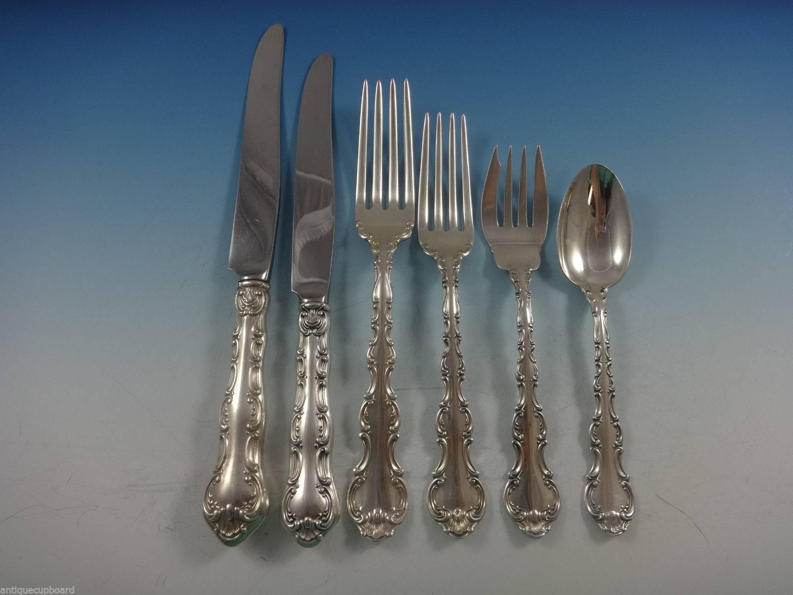 This set includes:

12 dinner size knives, 9 5/8".
12 dinner size forks, 7 5/8".
12 luncheon knives, 8 7/8".
12 luncheon forks, 7".
12 salad forks, 6 3/8".
12 teaspoons, 5 3/4".
One serving spoon, 8 1/2".
One cold