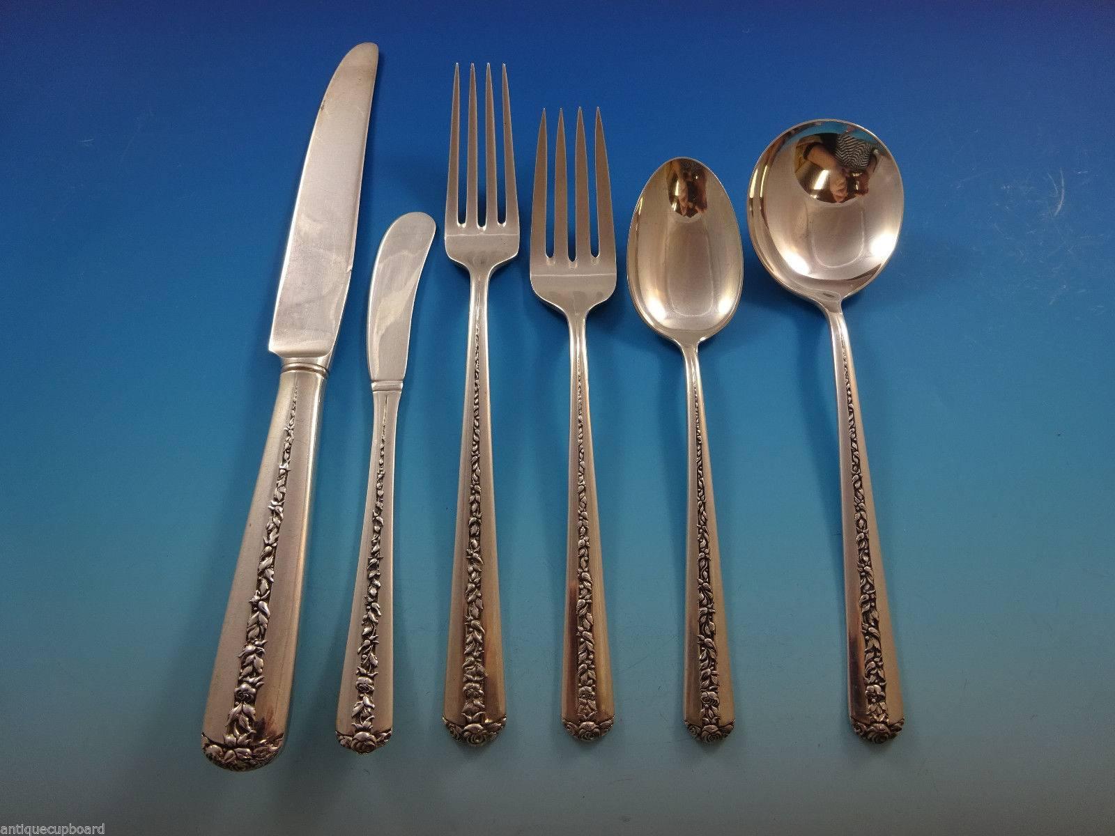 Highly polished sides with a trellis of rambling roses down the center and of the handle best describes the Rambler Rose pattern first introduced by Towle in 1937.
 

 Beautiful Rambler Rose by Towle sterling silver flatware set - 52 pieces. This
