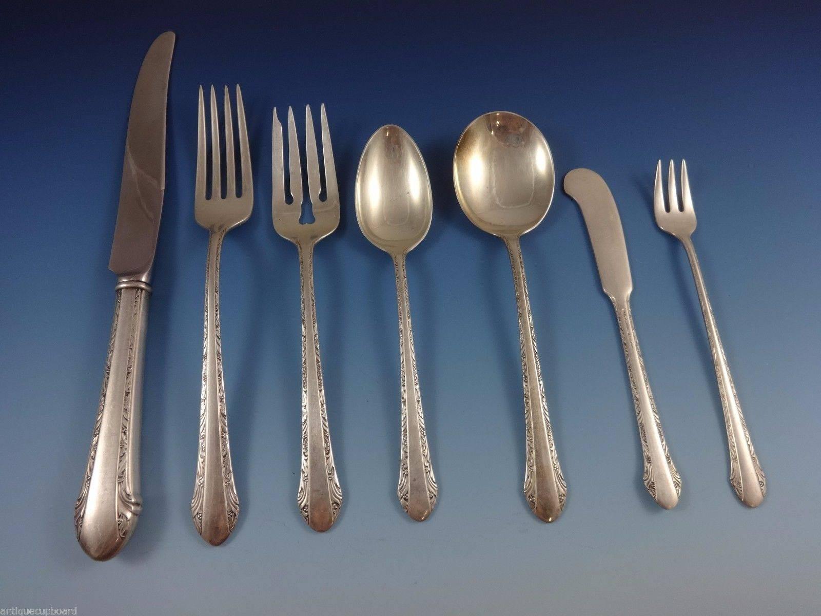 Chased Romantique by Alvin sterling silver flatware set of 68 pieces. This set includes:
Eight knives, 9