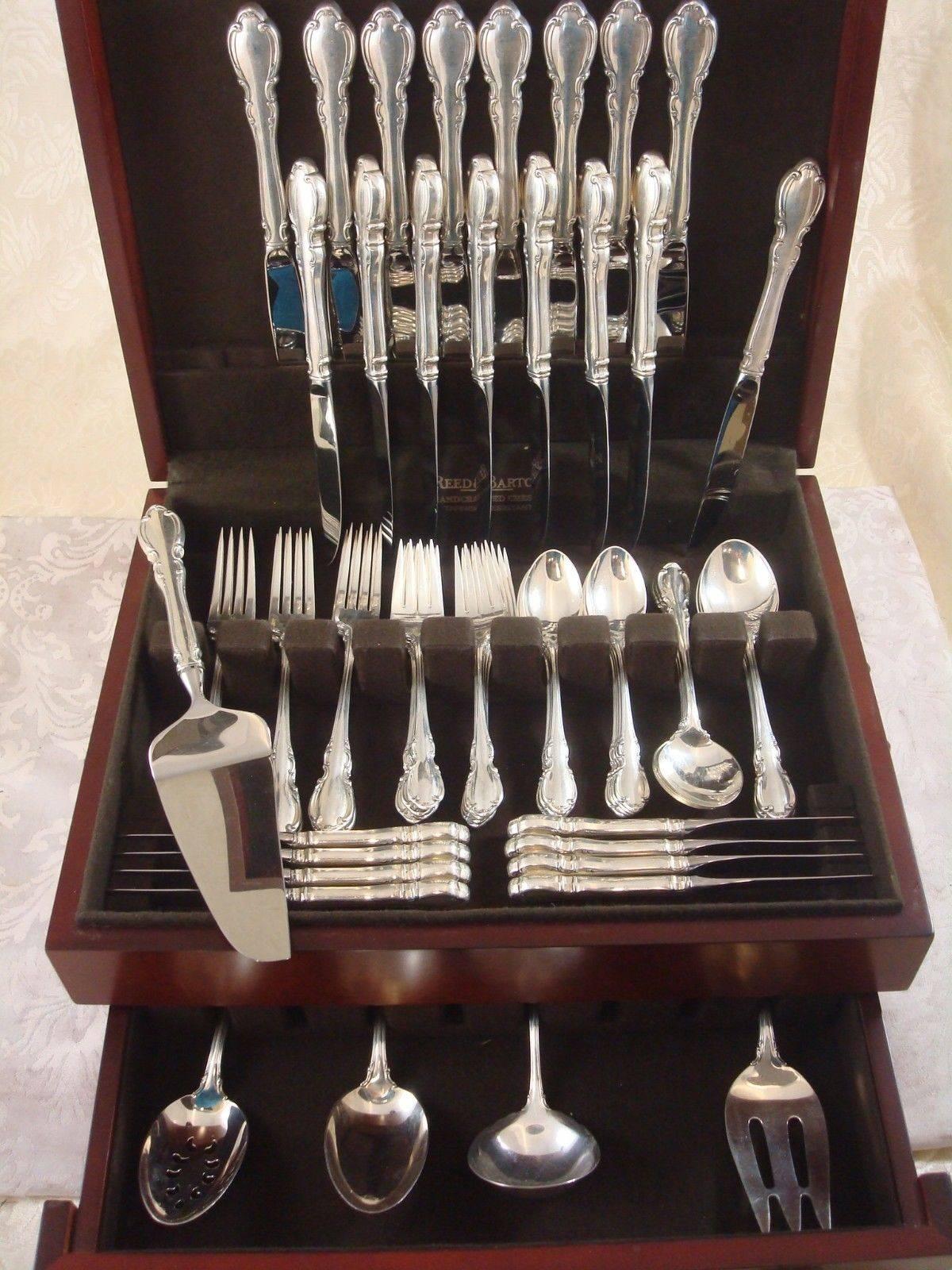 Dinner size Legato by Towle sterling silver flatware set of 61 pieces, in excellent condition. This set includes:

Eight dinner size knives, 9 1/2