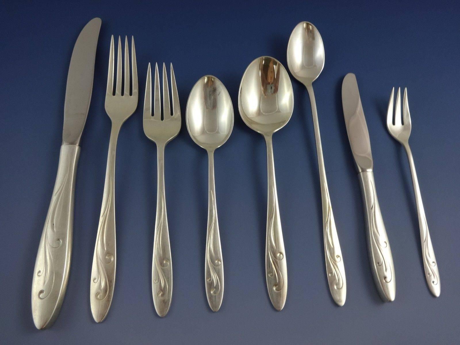 Beautiful awakening by Towle sterling silver Flatware set, 74 pieces. This set includes:

Eight Knives, 8 7/8
