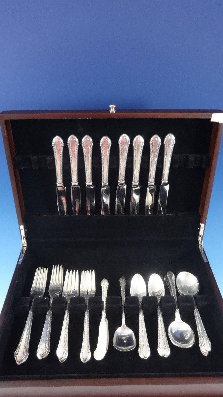 Chased Romantique by Alvin sterling silver flatware set of 49 Pieces. This set includes:

Eight knives, 9
