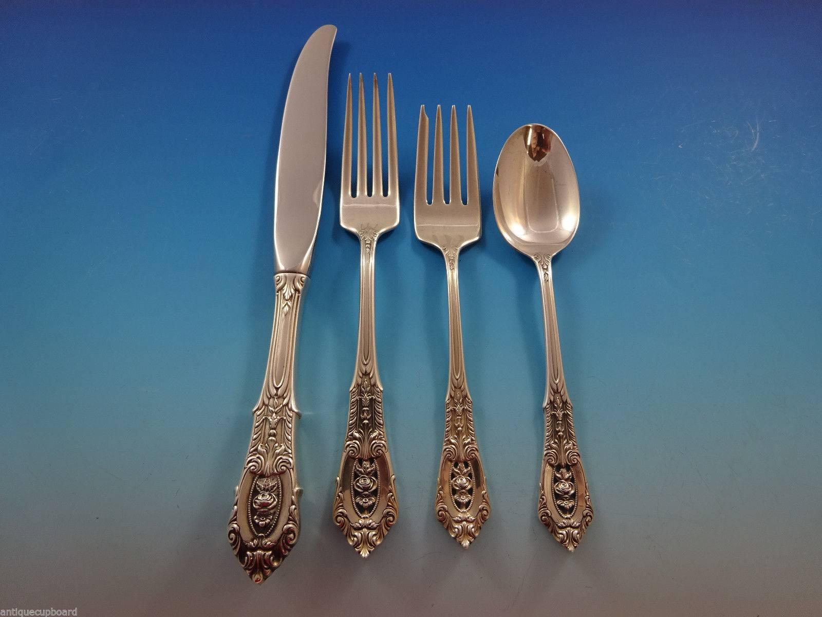 Rose Point by Wallace sterling silver flatware set, 32 pieces. This set includes: Eight knives, 9