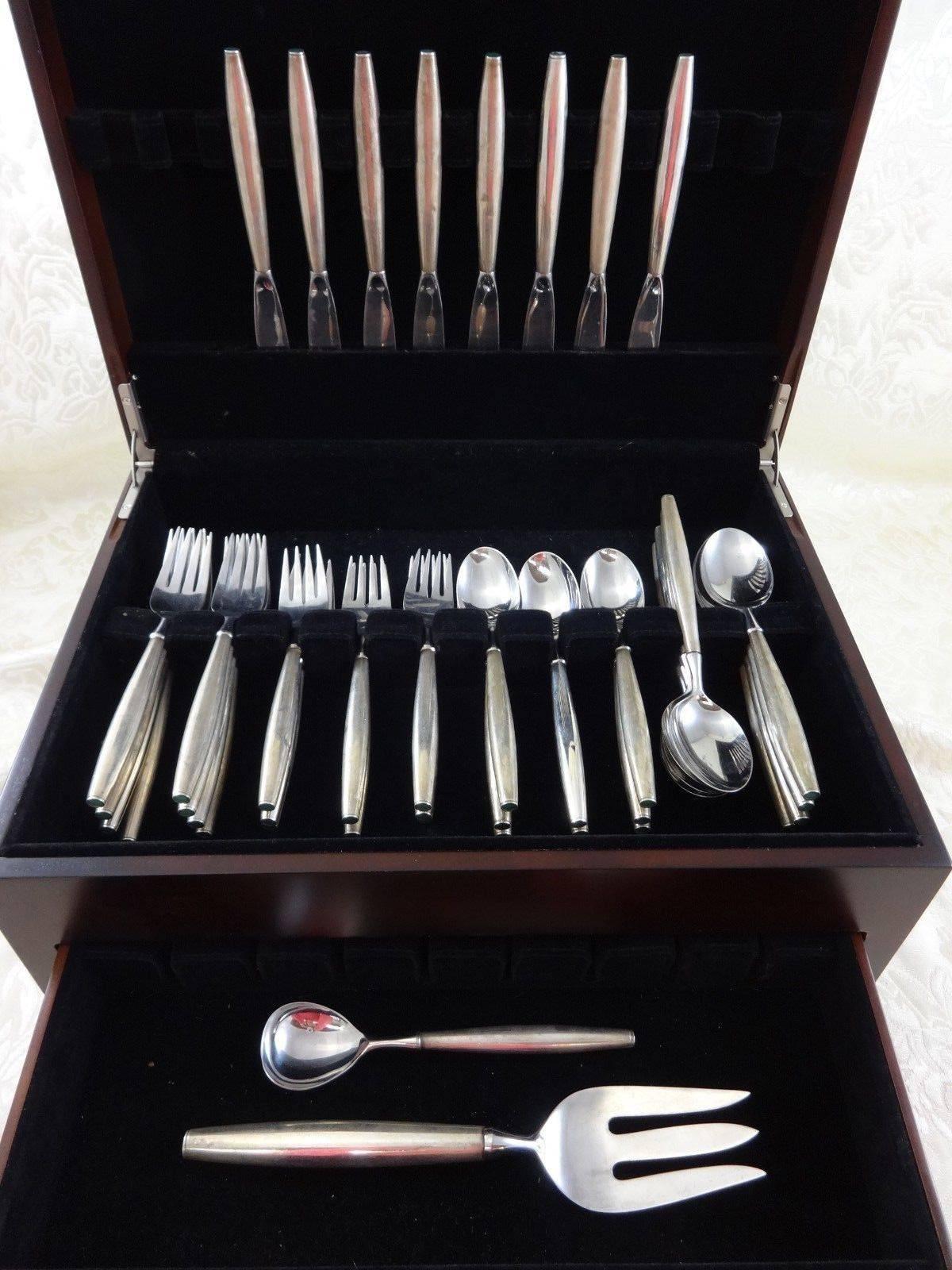 Jade plain by Contempra House (division of Towle) sterling silver flatware set of 42 pieces. This pattern was designed by noted Modernist midcentury designer, Earl Pardon, in the year 1955. This unique modernism pattern features hollow handles with