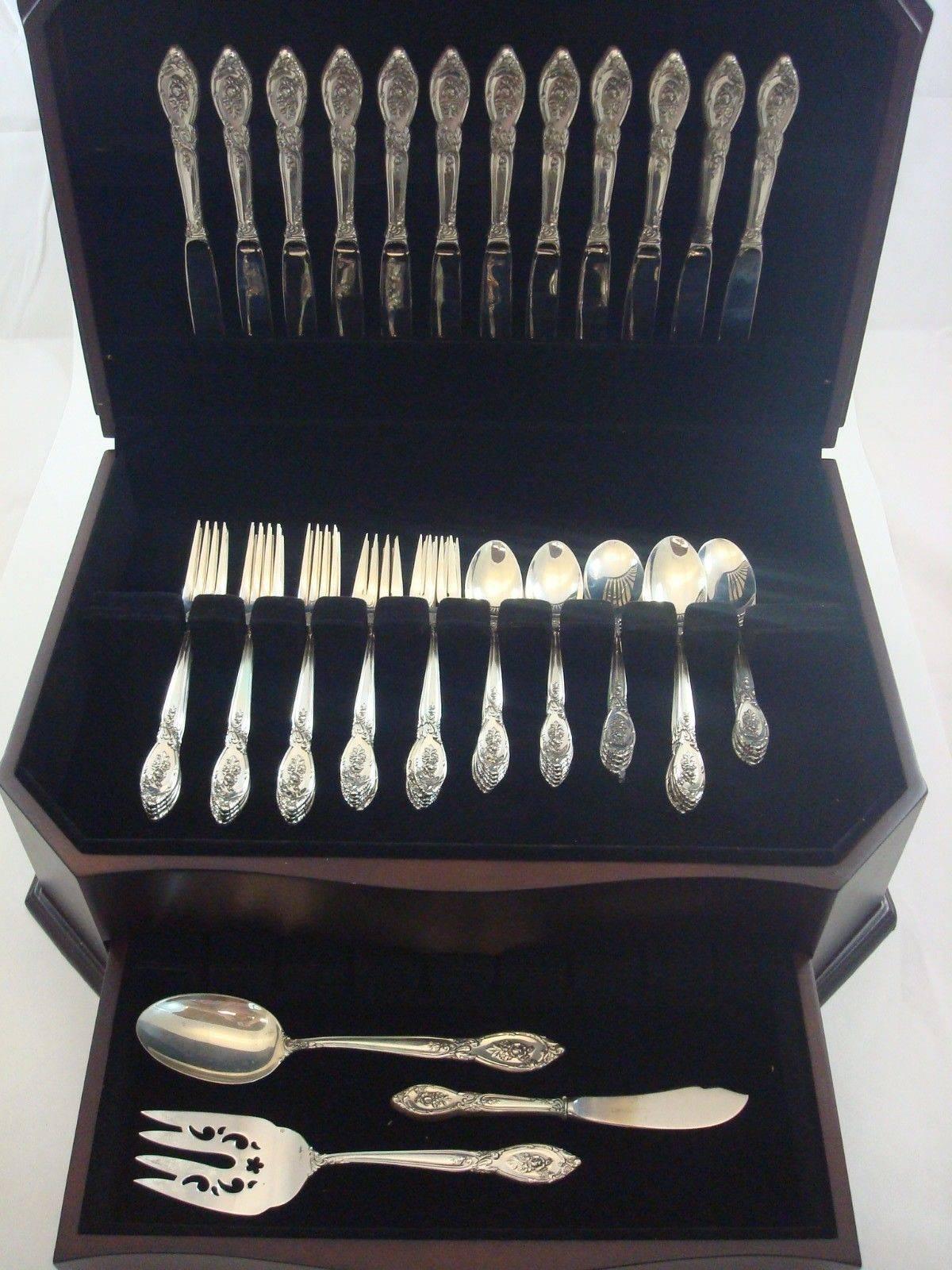 Beautiful rose elegance by Lunt sterling silver flatware set of 63 pieces. This set includes:

12 knives, 9