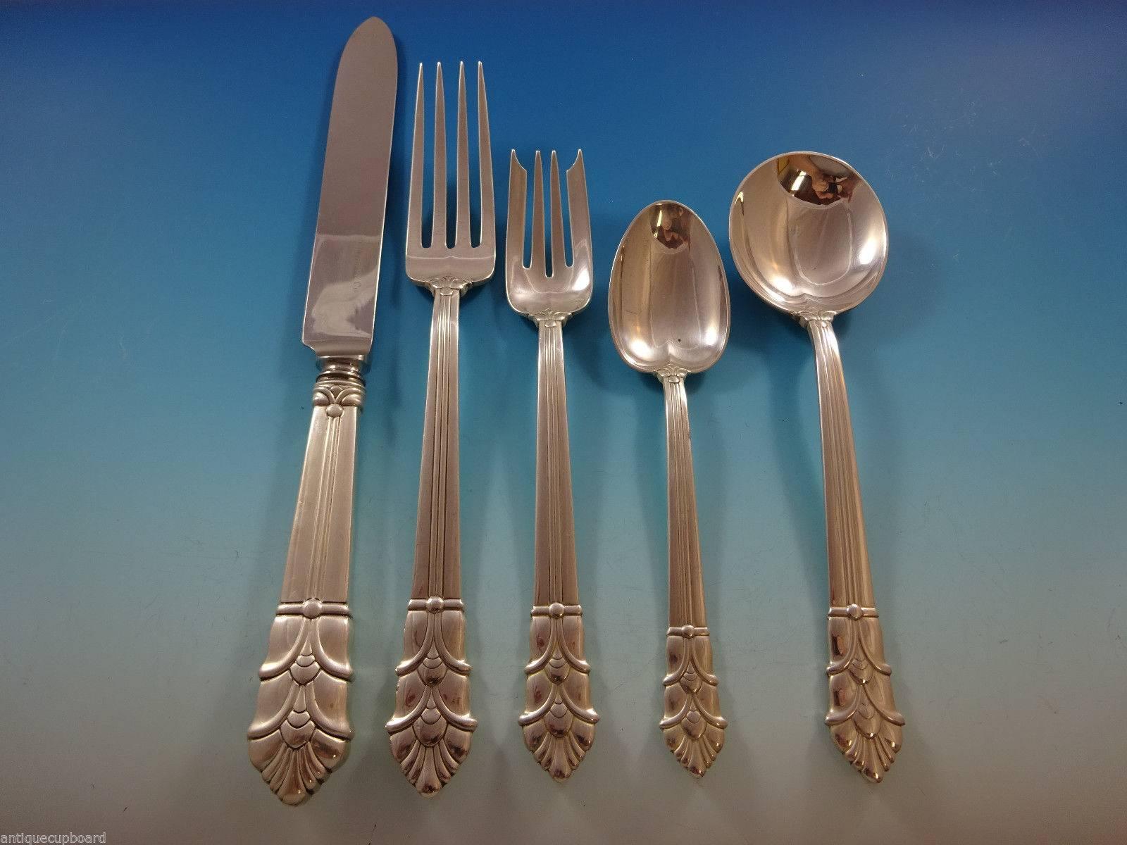 Exceptional Palmette by Tiffany & Co. Dinner size sterling silver flatware set, 65 pieces. This set includes:

12 dinner size knives, pointed, 9 3/4