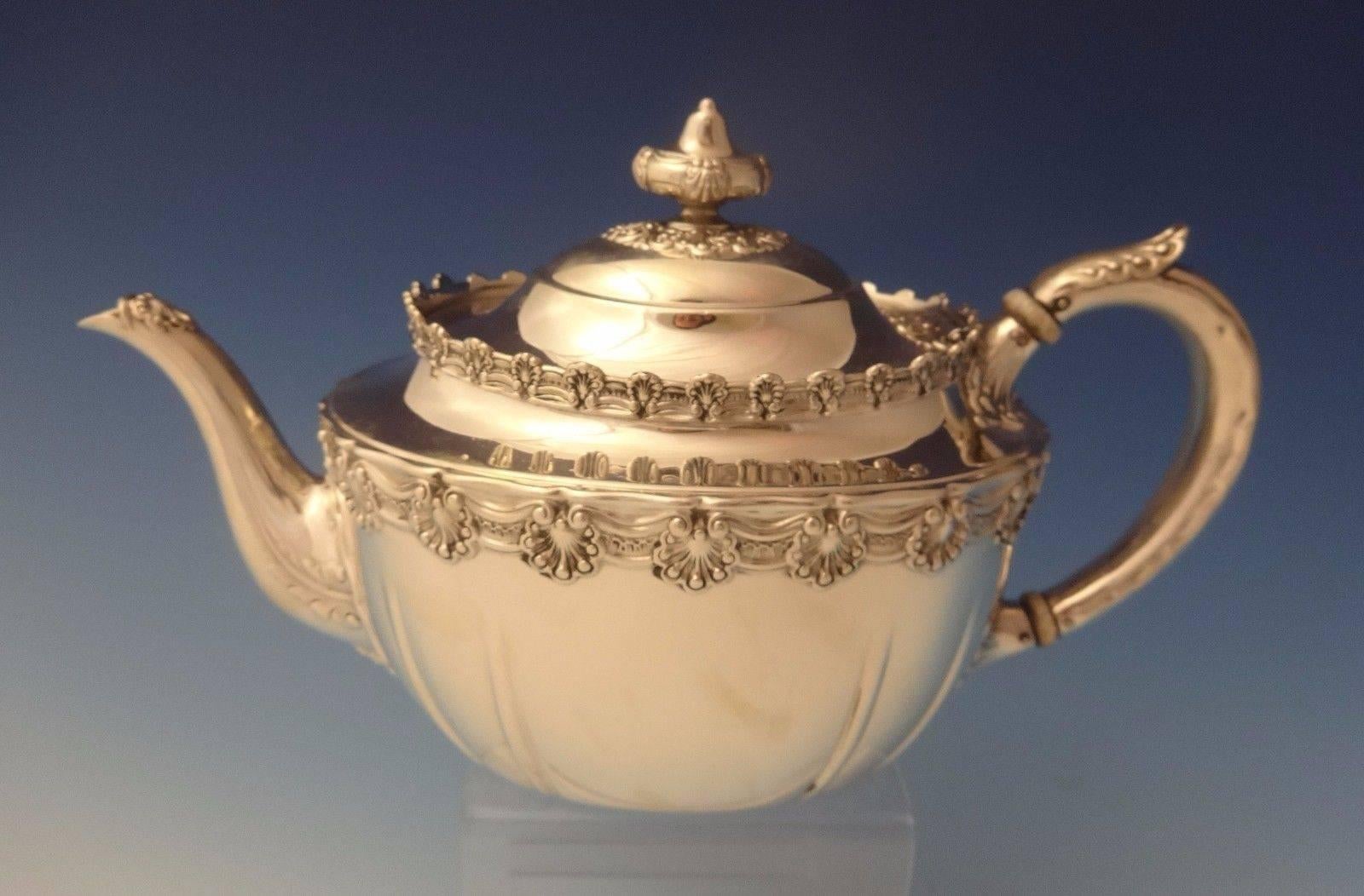 English King by Tiffany & Co. three-piece sterling tea set. The pieces are marked with a 